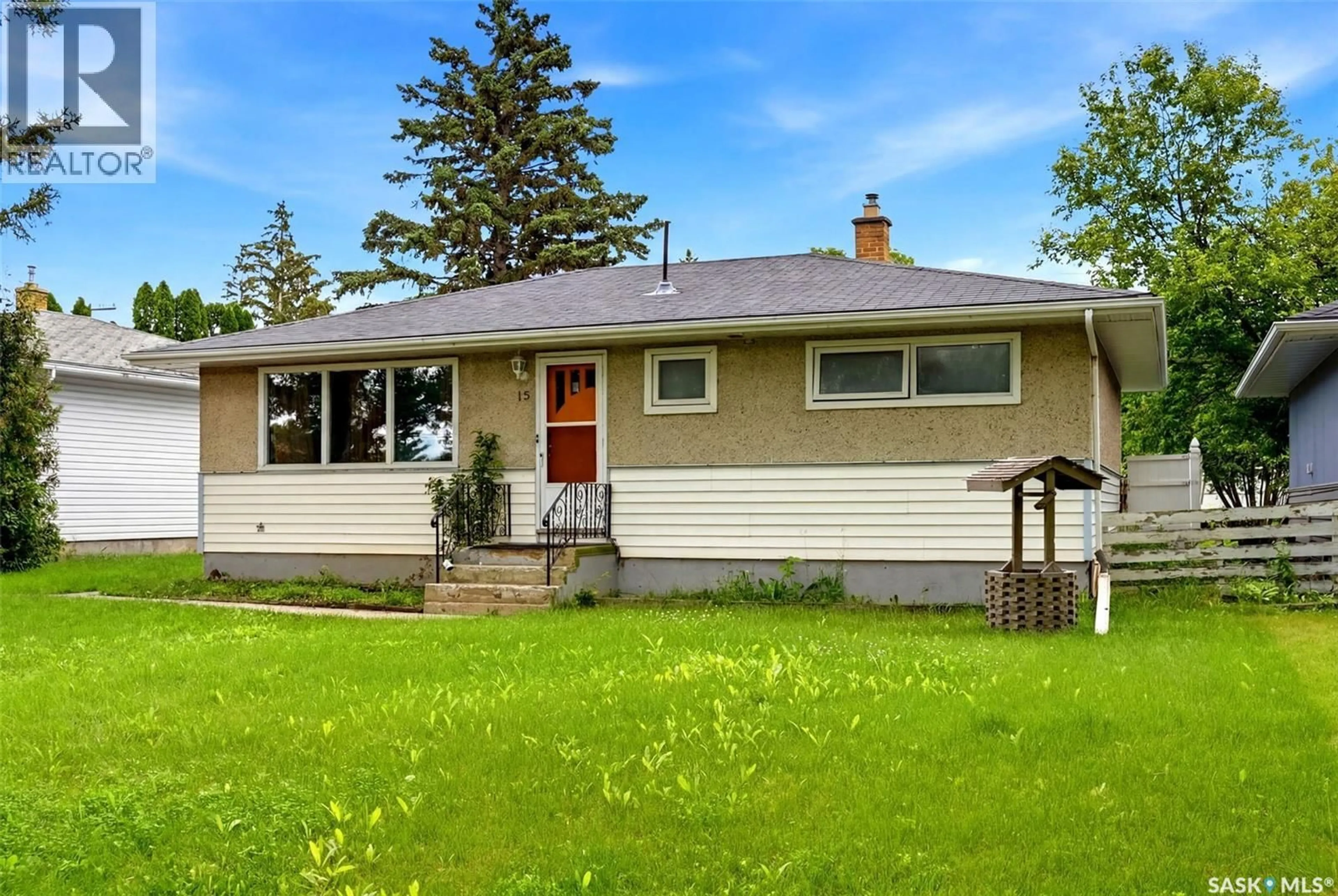 Home with vinyl exterior material, street for 15 OTTAWA PLACE, Regina Saskatchewan S4R2V6