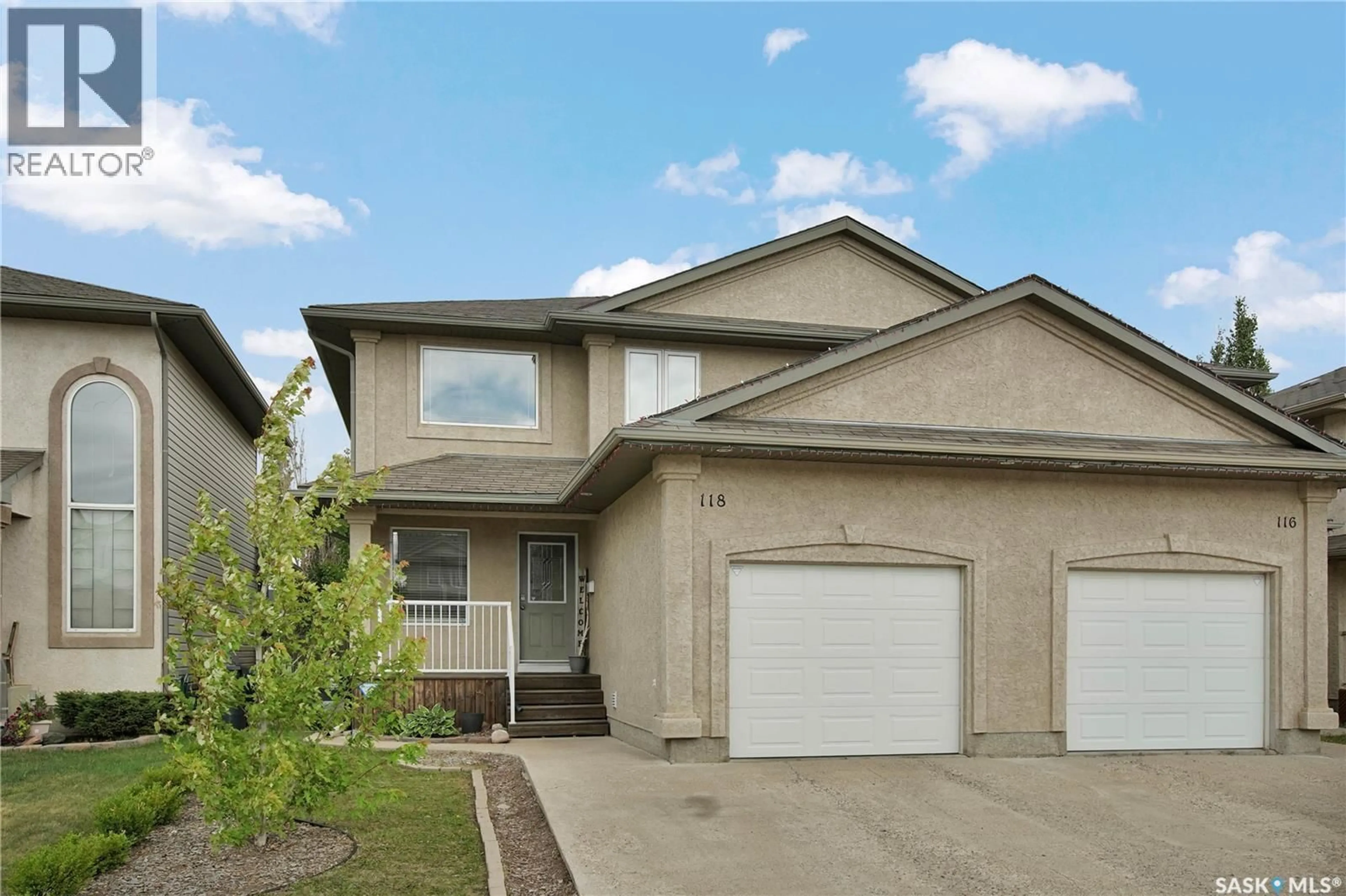 Home with vinyl exterior material, street for 118 MEADOWLARK PARK, Warman Saskatchewan S0K0A1