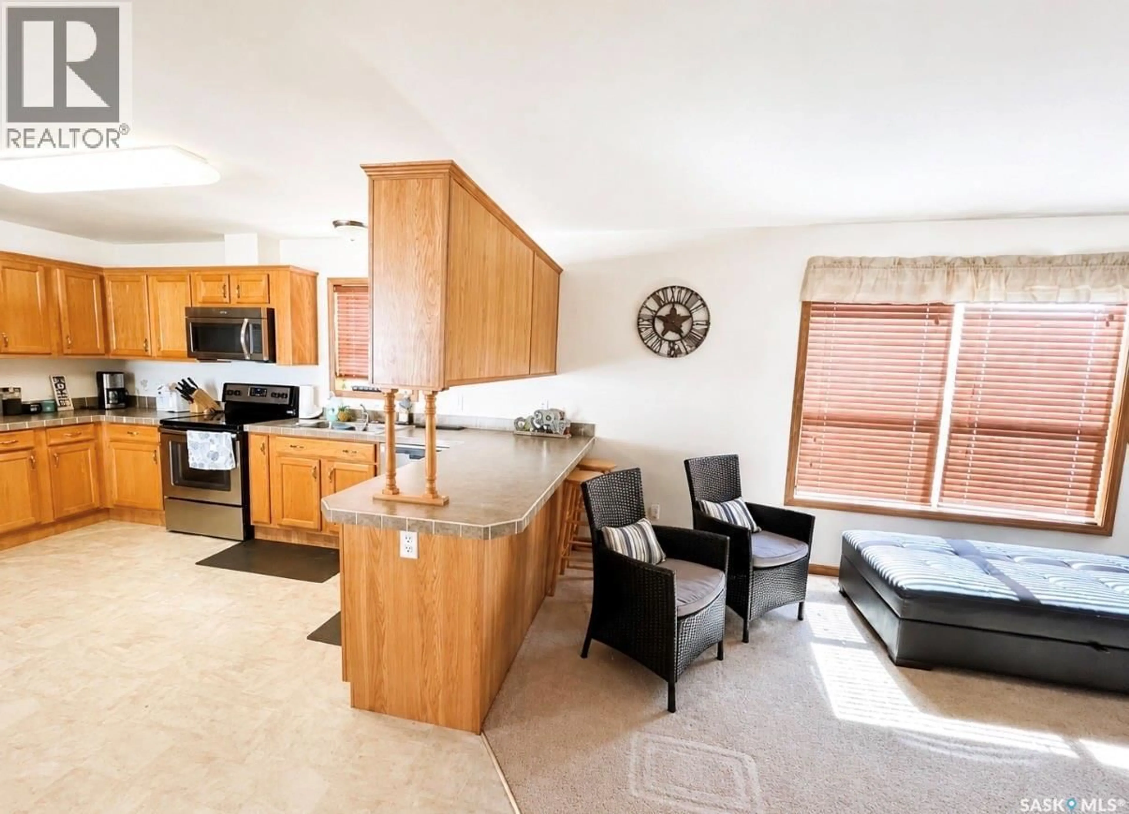 Open concept kitchen, ceramic/tile floor for 19 MEADOWLARK COURT, Diefenbaker Lake Saskatchewan S0H3P0