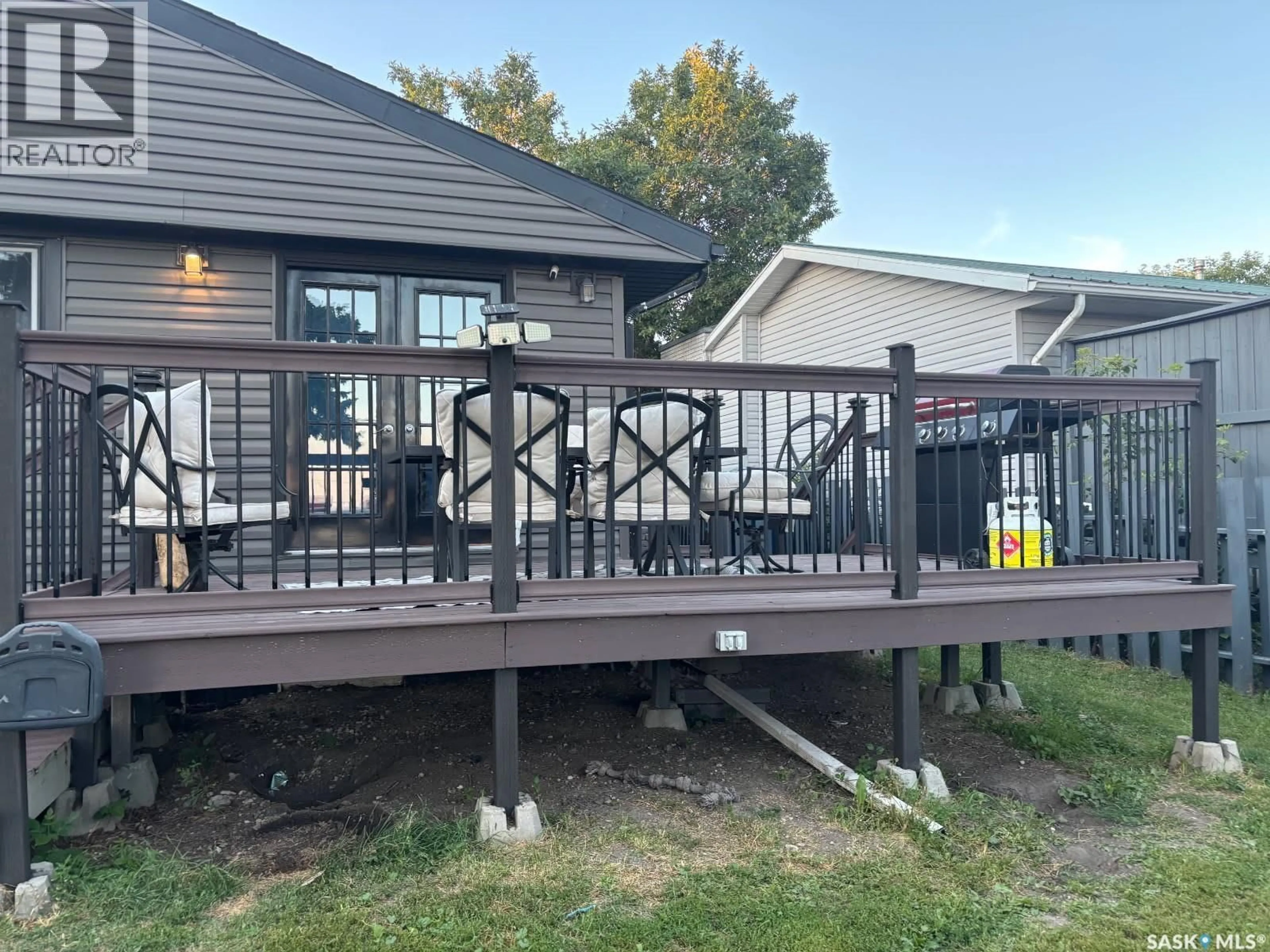 Patio, water/lake/river/ocean view for 705 PROSPECT AVENUE, Oxbow Saskatchewan S0C2B0