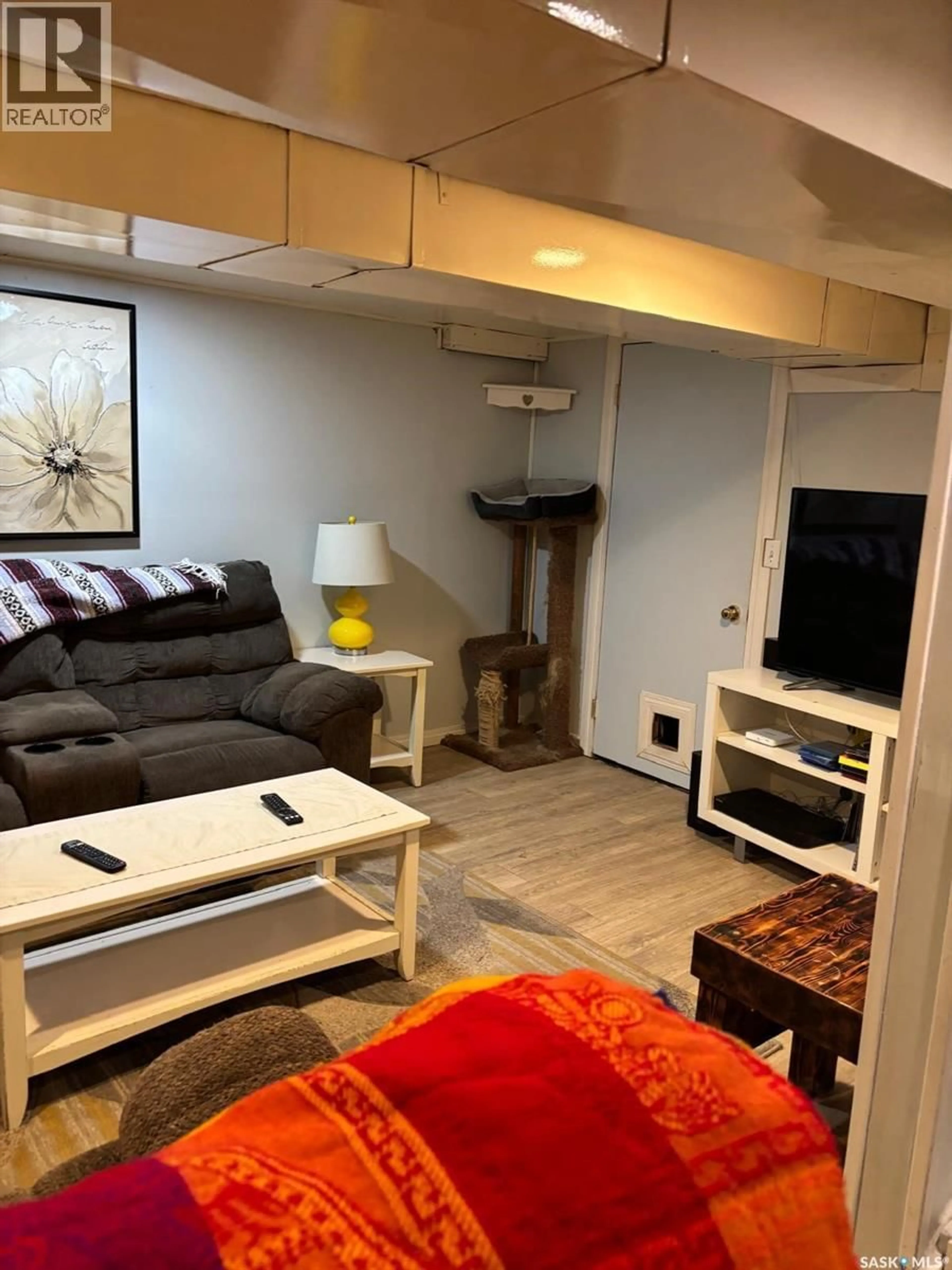 Living room with furniture, unknown for 705 PROSPECT AVENUE, Oxbow Saskatchewan S0C2B0
