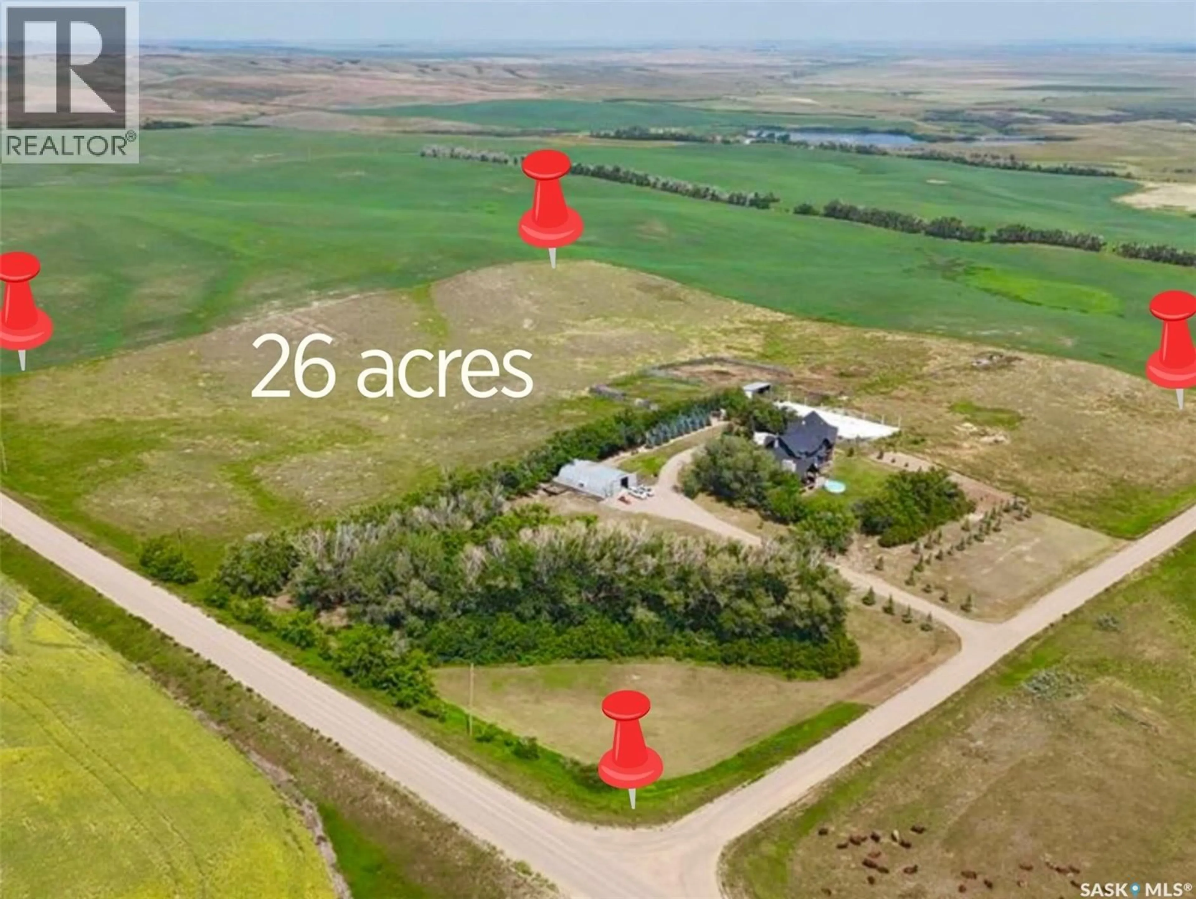A pic from outside/outdoor area/front of a property/back of a property/a pic from drone, building for East - 1 HWY ACREAGE, Excelsior Rm No. 166 Saskatchewan S9H4M6