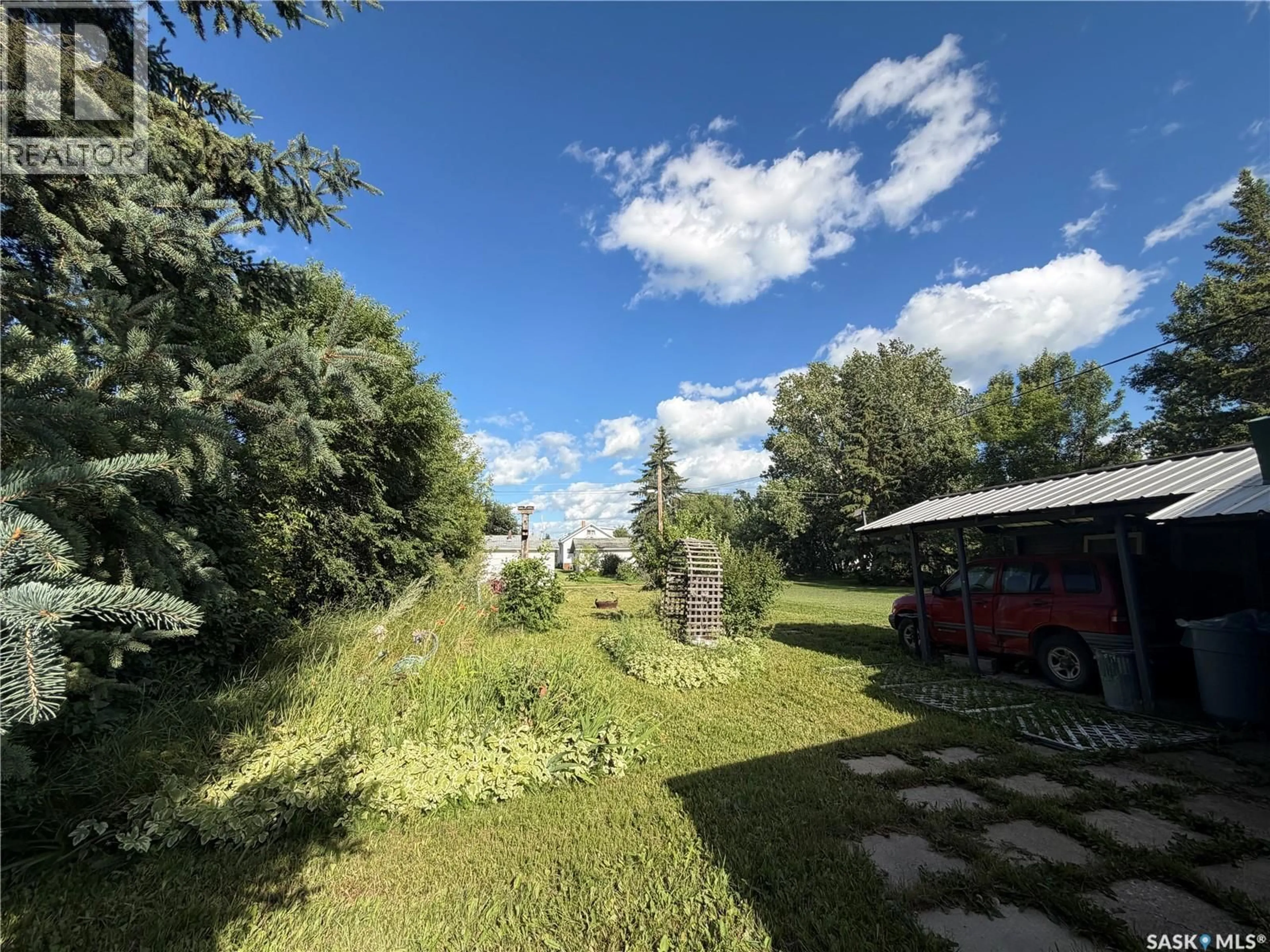 A pic from outside/outdoor area/front of a property/back of a property/a pic from drone, forest/trees view for 143 GLADSTONE AVENUE, Yorkton Saskatchewan S3N2A7