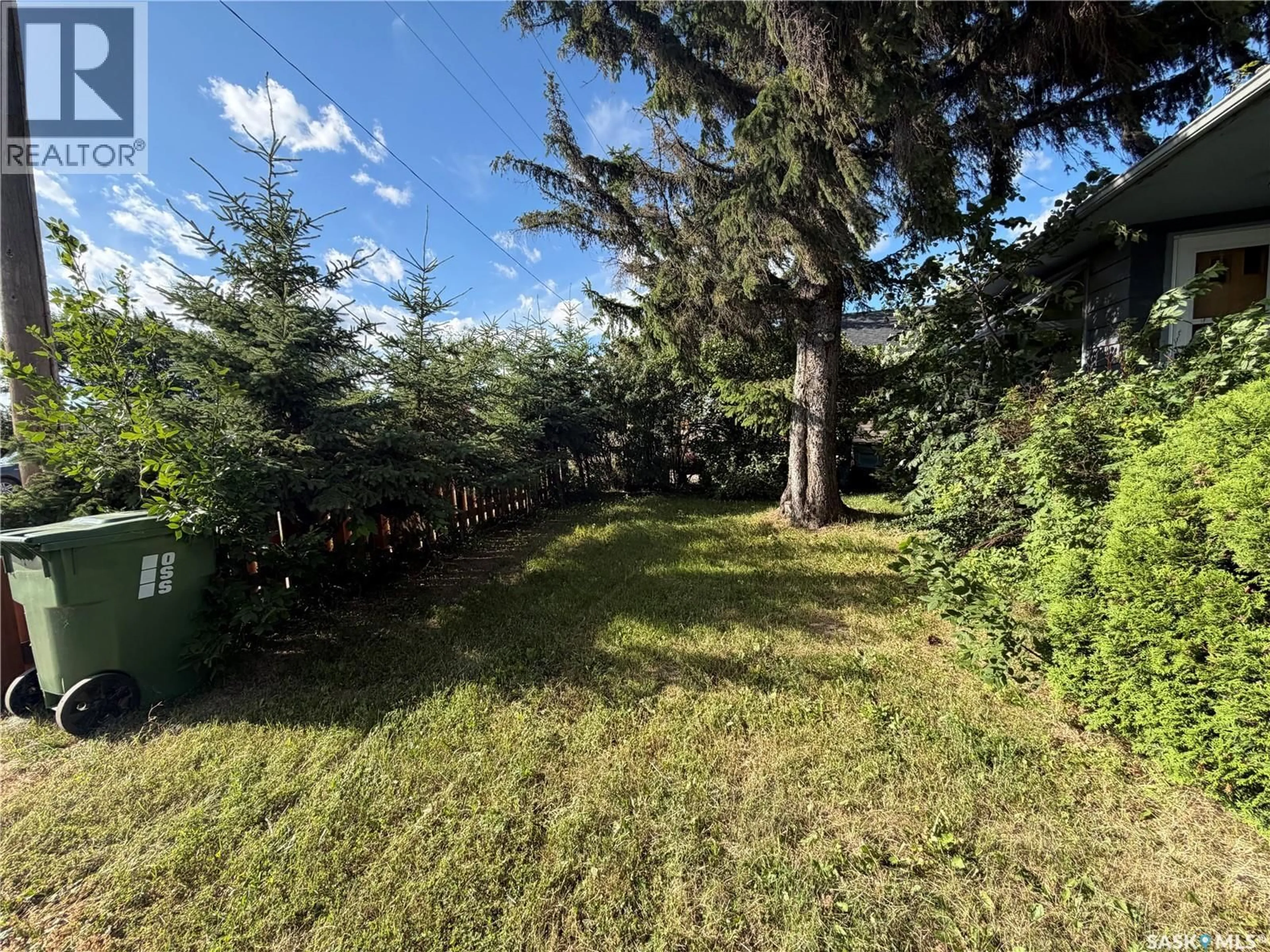 A pic from outside/outdoor area/front of a property/back of a property/a pic from drone, forest/trees view for 143 GLADSTONE AVENUE, Yorkton Saskatchewan S3N2A7