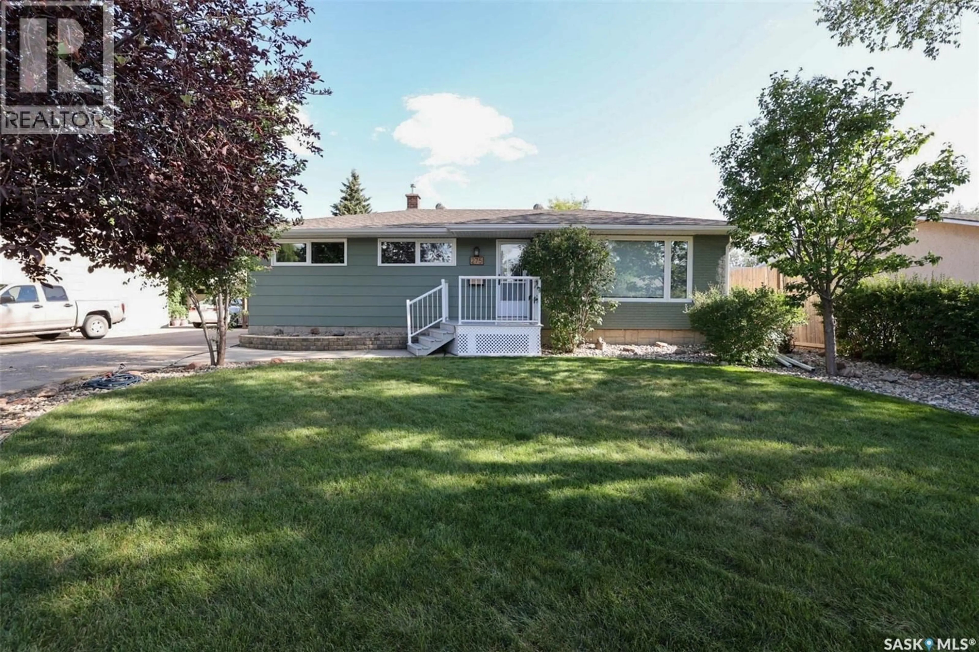 Home with vinyl exterior material, street for 275 RODENBUSH DRIVE, Regina Saskatchewan S4R6X1