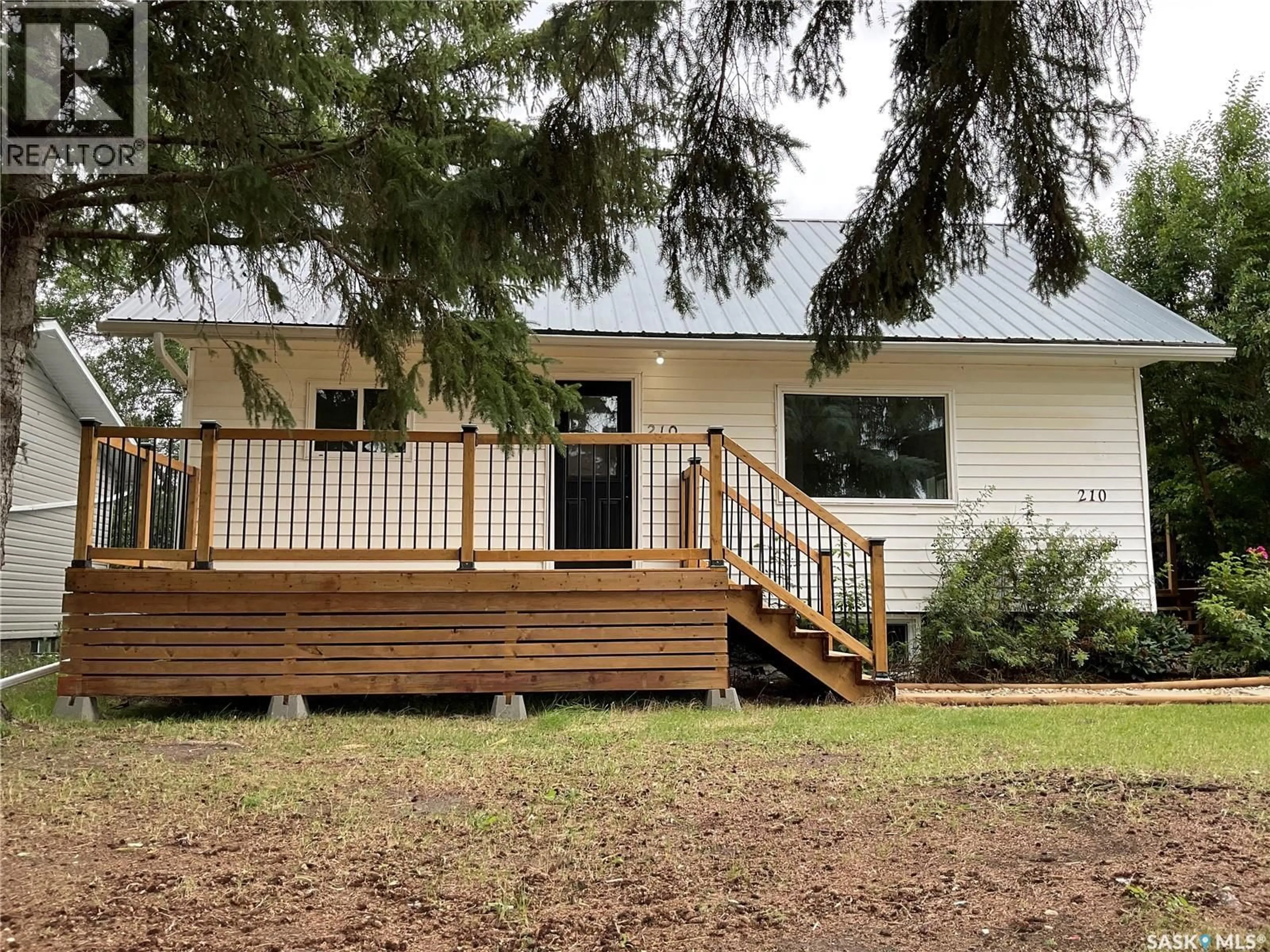 Home with vinyl exterior material, unknown for S - 210 7TH STREET, Wakaw Saskatchewan S0K4P0
