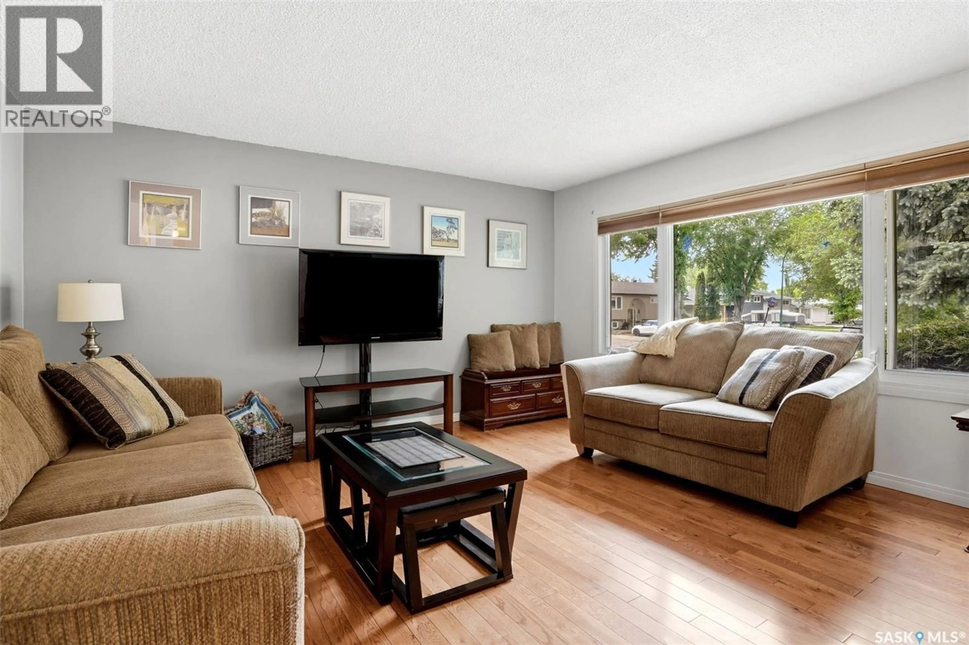 Living room with furniture, unknown for 60 KRIVEL CRESCENT, Regina Saskatchewan S4R5C5