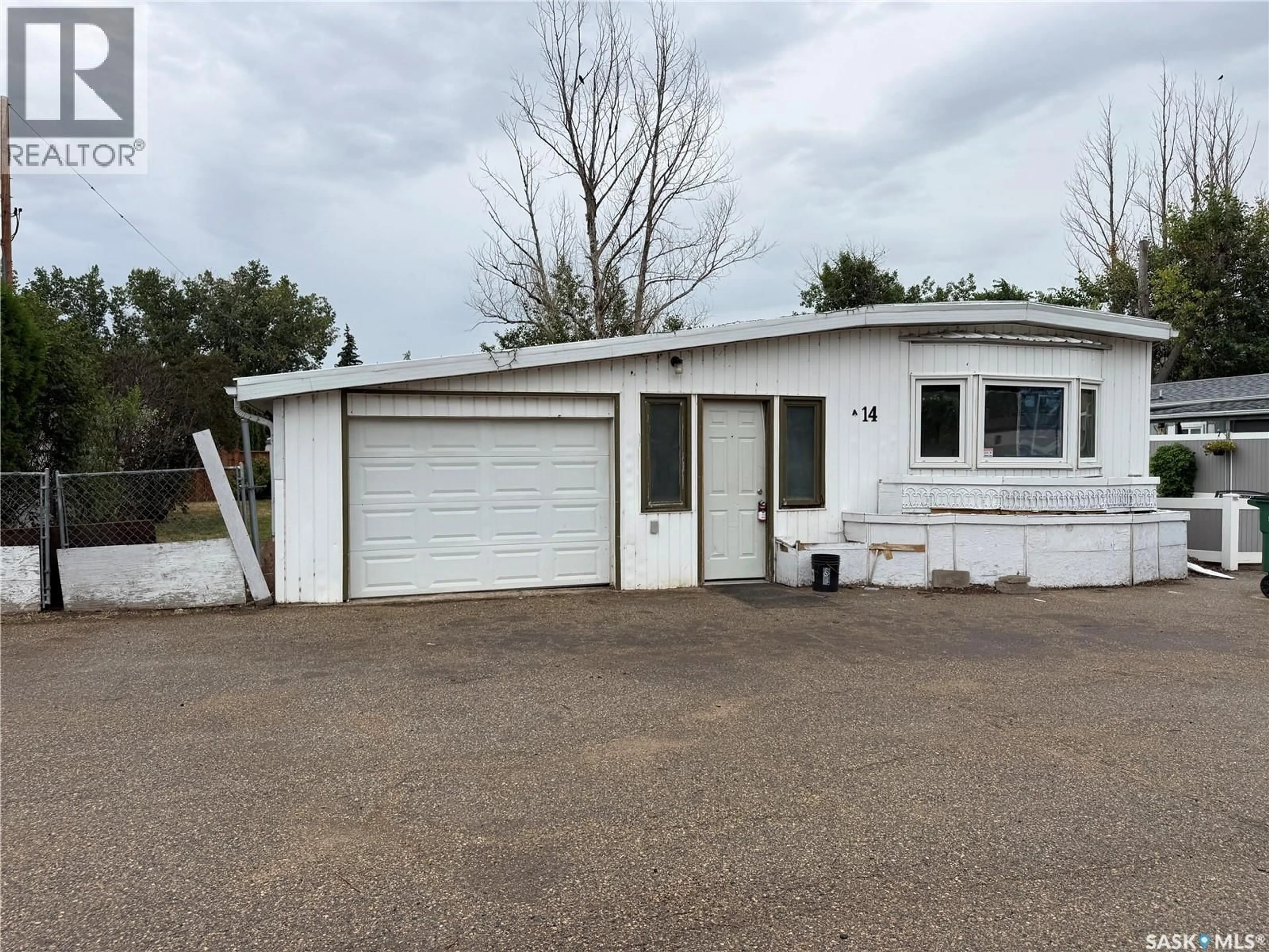 Home with vinyl exterior material, street for A14 - 1455 9TH AVENUE, Moose Jaw Saskatchewan S6J1C6