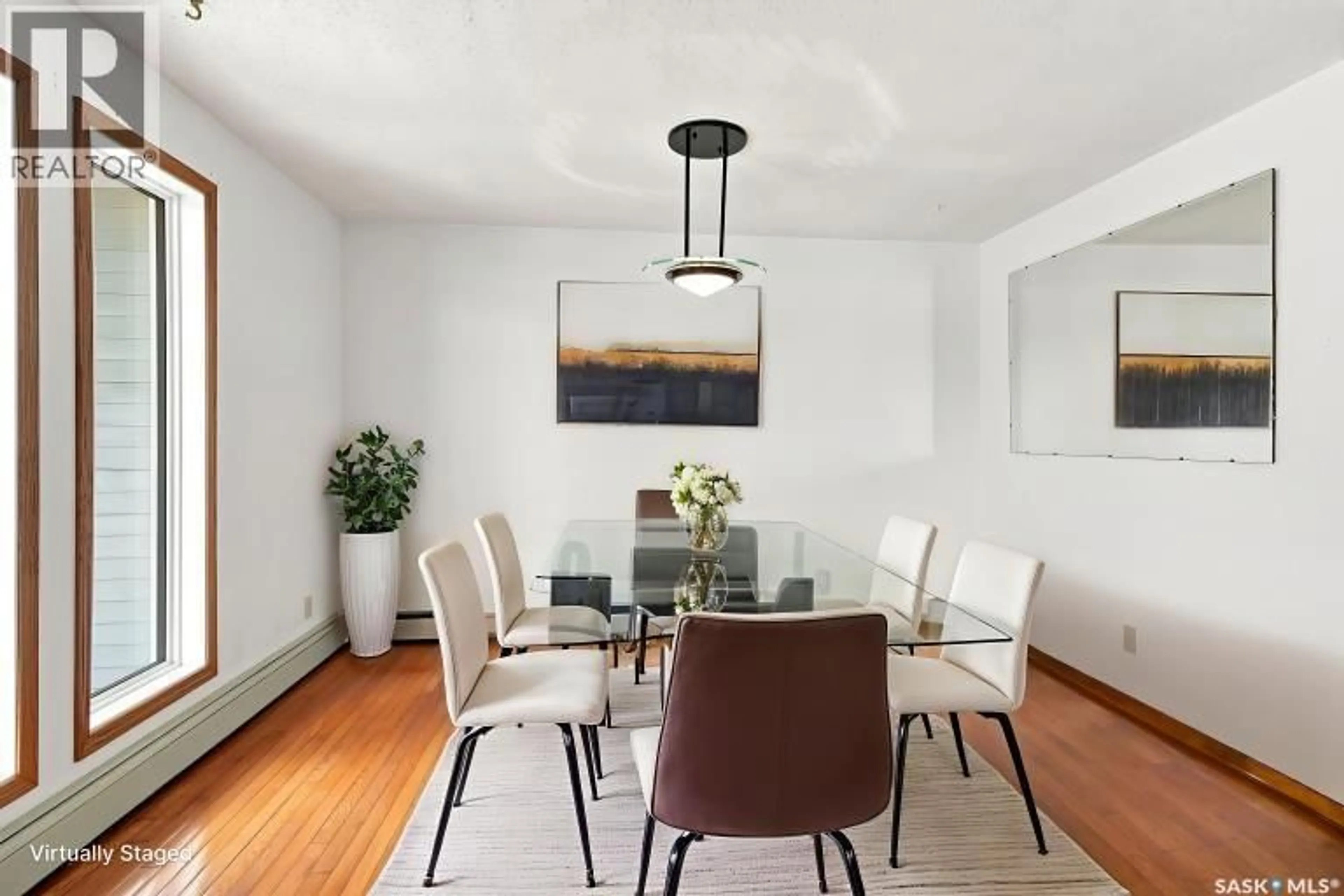 Dining room, wood/laminate floor for 203 - 918 ARGYLE AVENUE, Saskatoon Saskatchewan S7H2V9