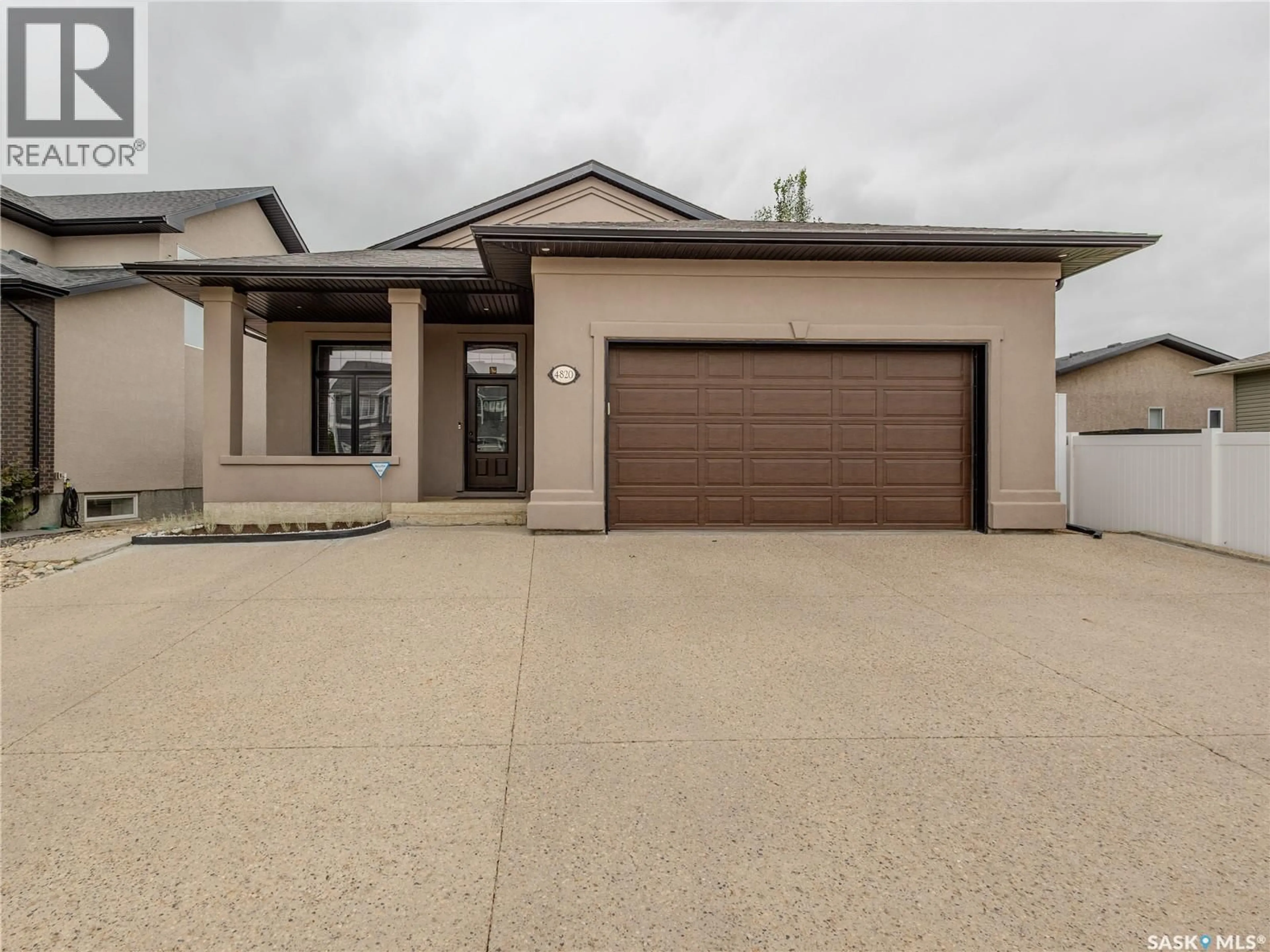 Home with vinyl exterior material, street for 4820 MCCOMBIE CRESCENT, Regina Saskatchewan S4W0B2
