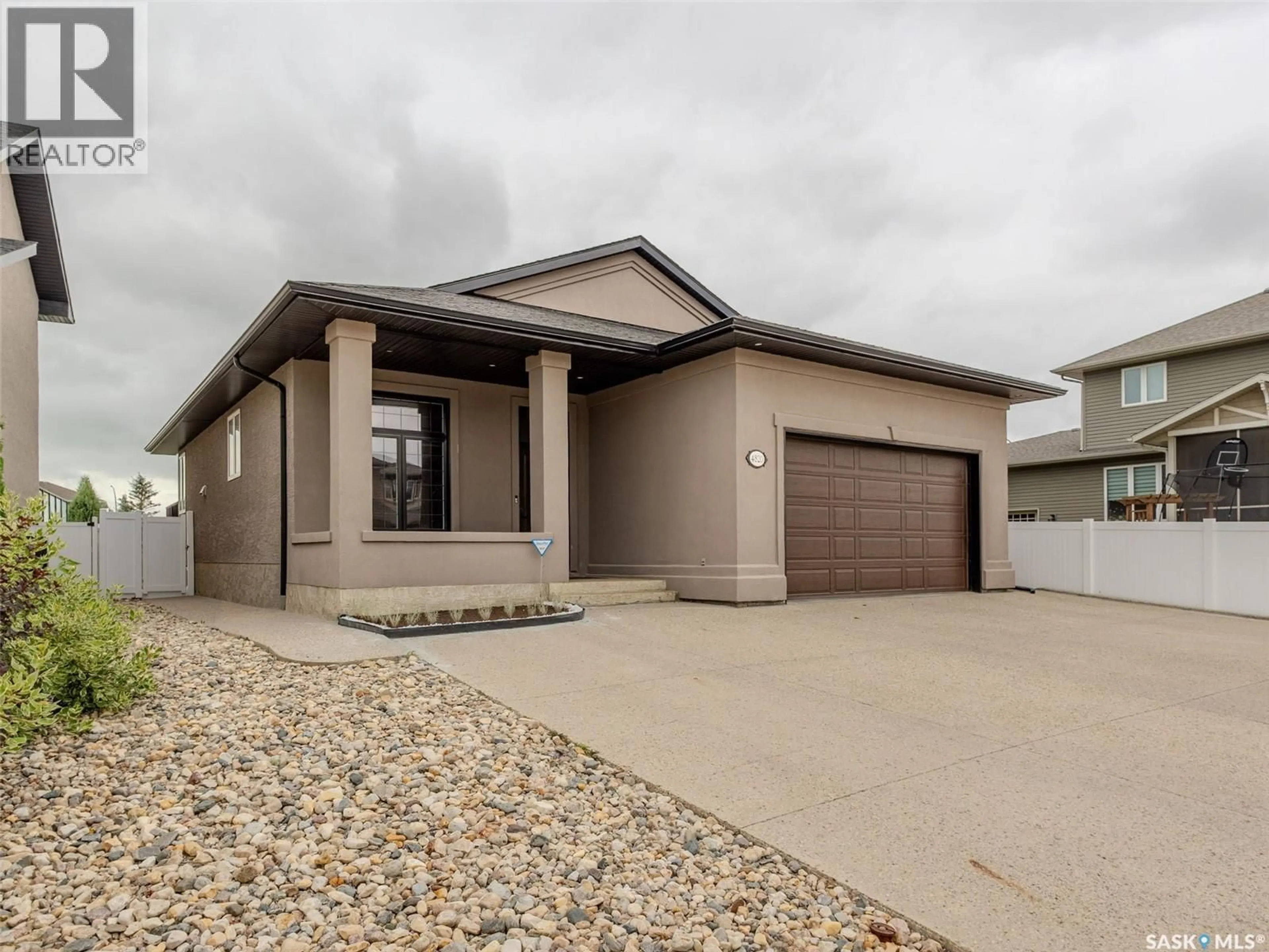 Home with vinyl exterior material, street for 4820 MCCOMBIE CRESCENT, Regina Saskatchewan S4W0B2