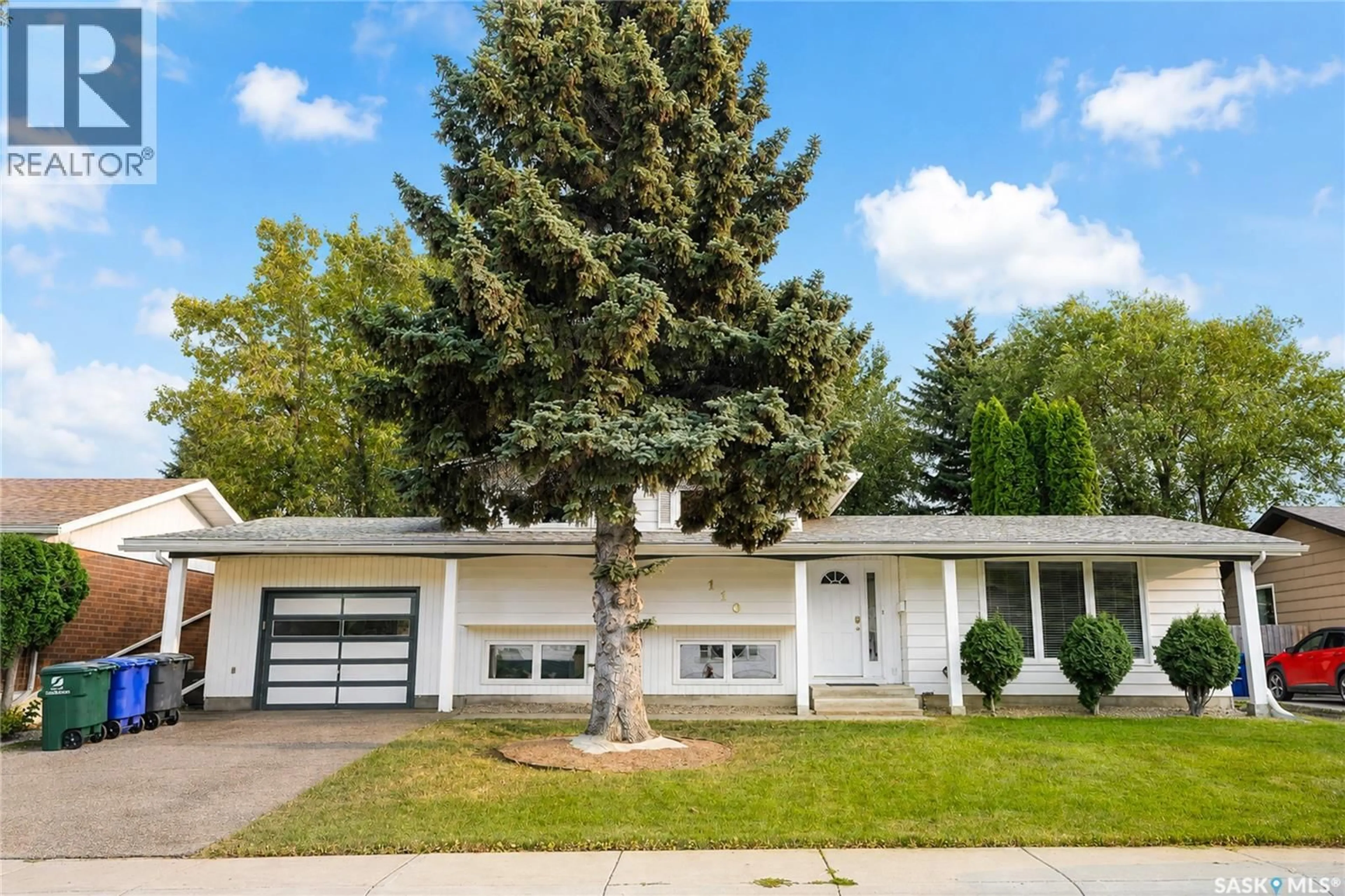 Home with vinyl exterior material, street for 110 MEGLUND PLACE, Saskatoon Saskatchewan S7H4Z7