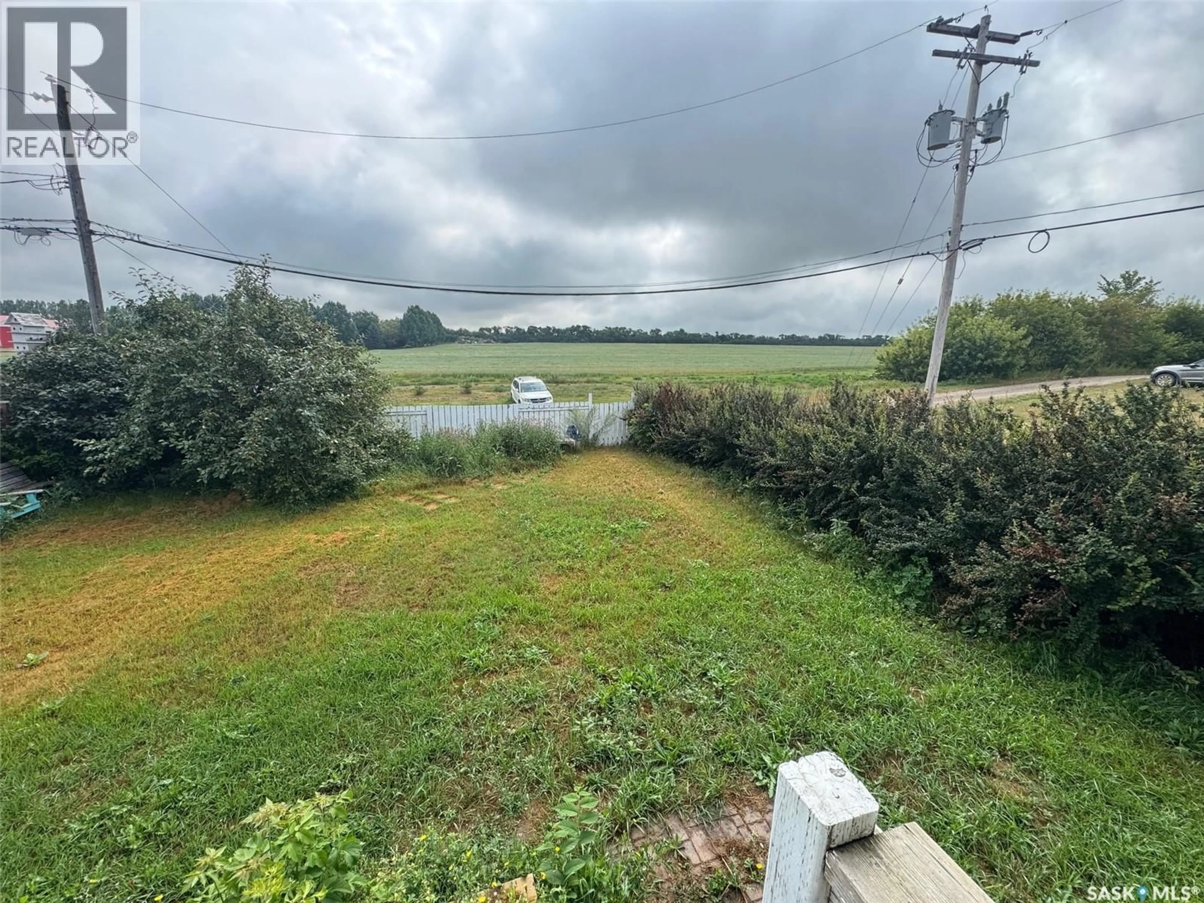 A pic from outside/outdoor area/front of a property/back of a property/a pic from drone, water/lake/river/ocean view for 303 1ST AVENUE, Naicam Saskatchewan S0K2Z0