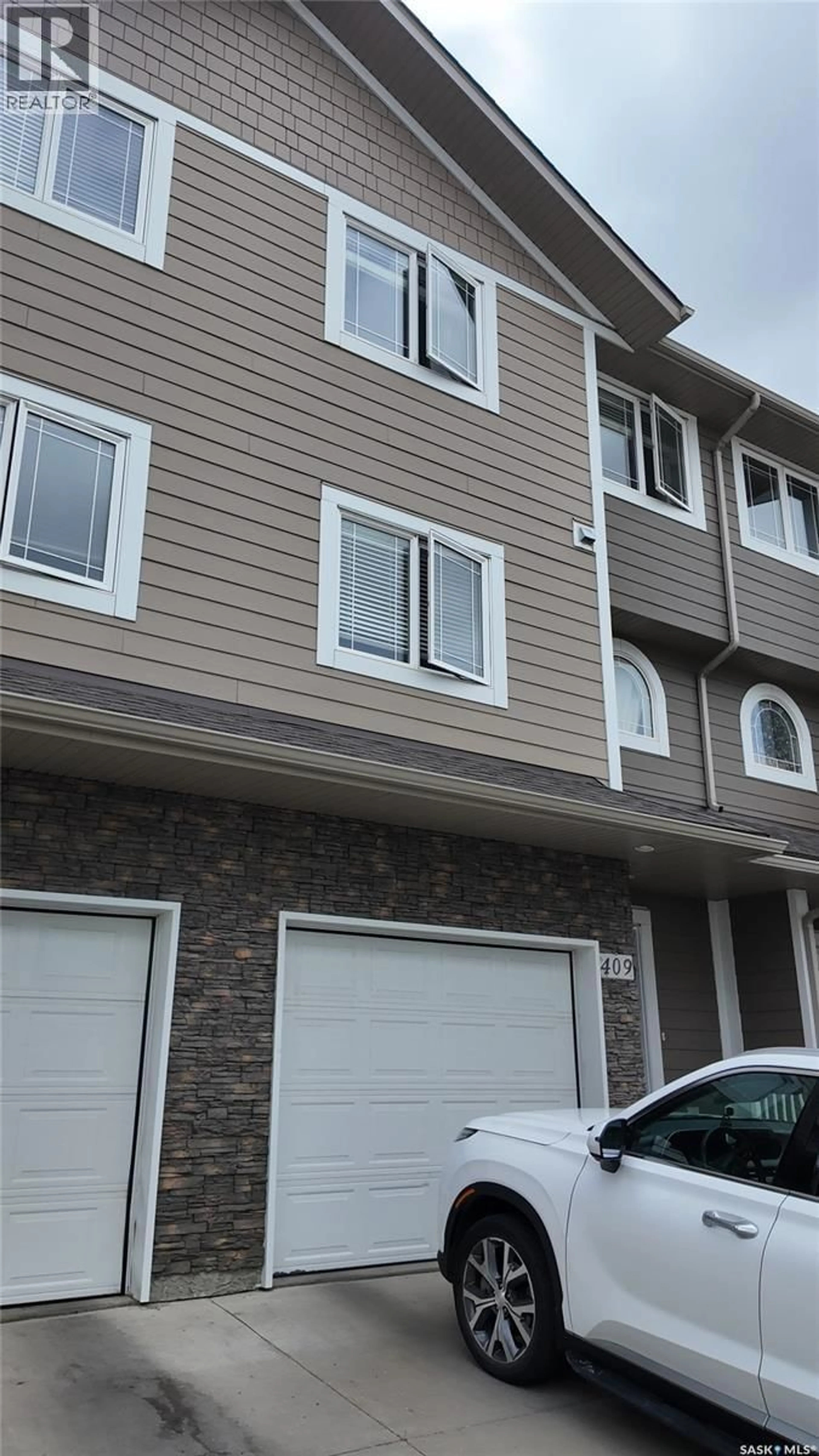 Home with vinyl exterior material, unknown for 409 212 WILLIS CRESCENT, Saskatoon Saskatchewan S7T0R6