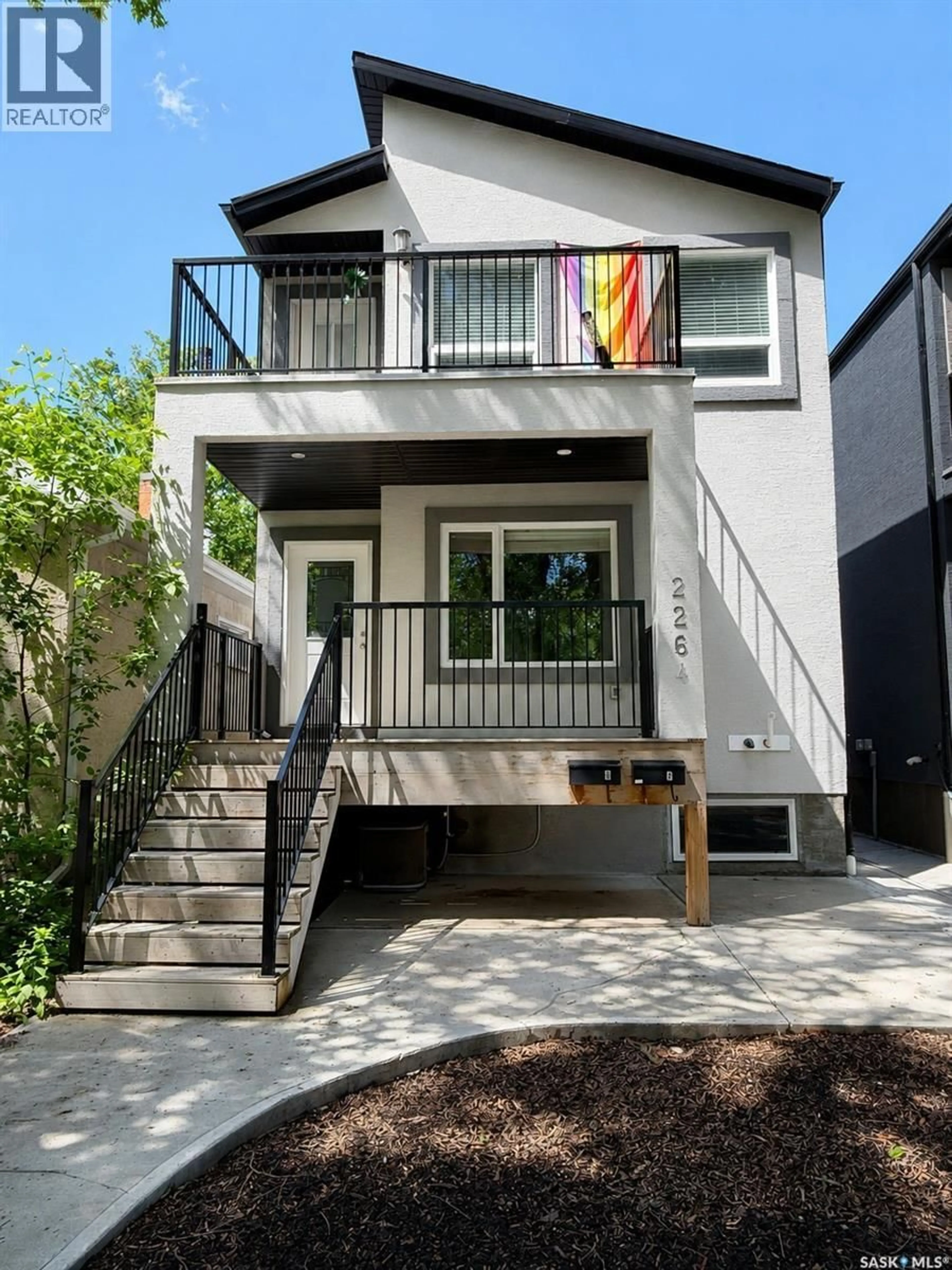 Home with vinyl exterior material, street for 2264 MONTREAL STREET, Regina Saskatchewan S4P1L6