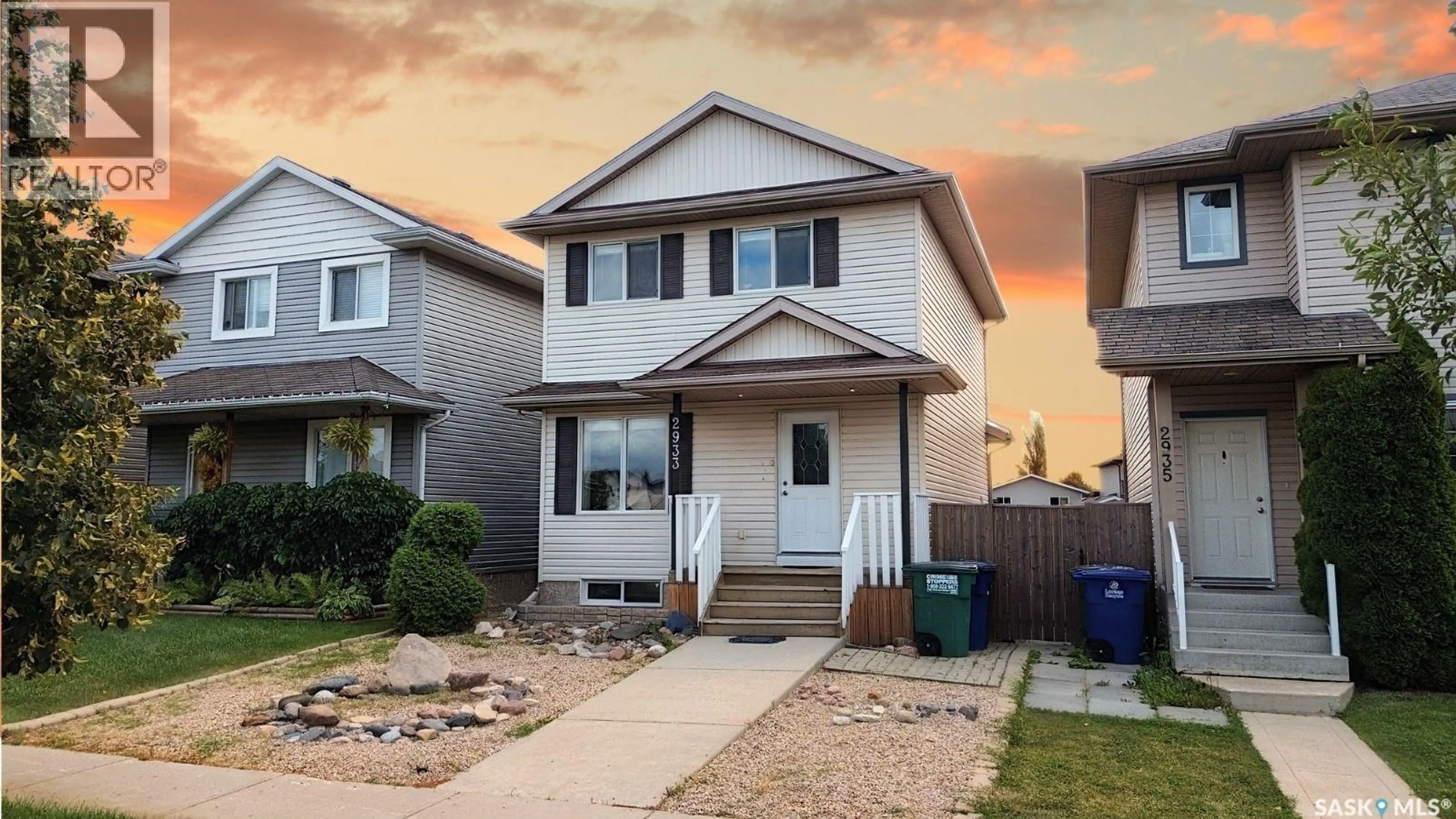Home with vinyl exterior material, street for 2933 MCCLOCKLIN ROAD, Saskatoon Saskatchewan S7R0A1