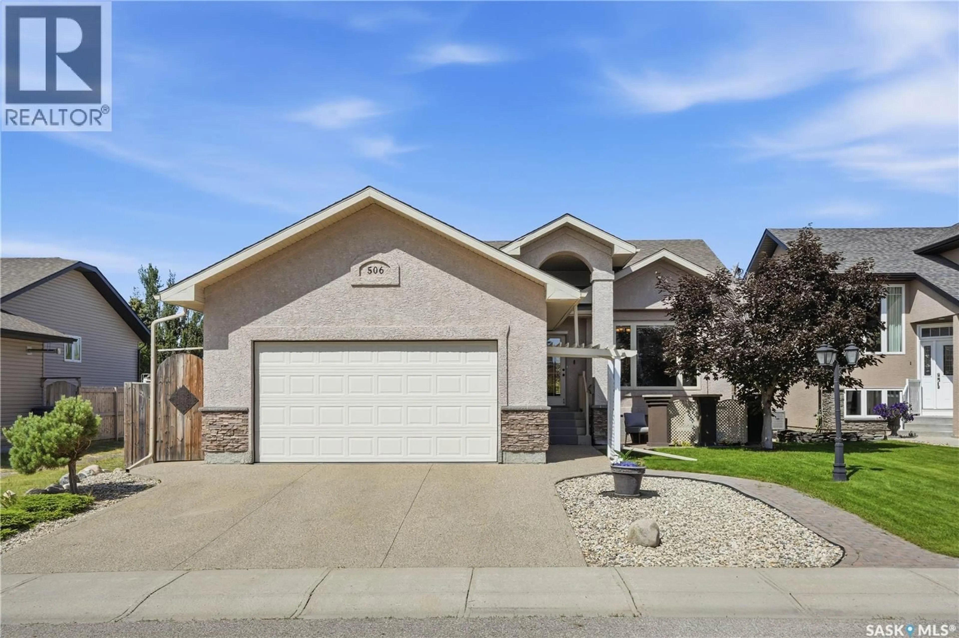Home with vinyl exterior material, street for 506 ANTLER CRESCENT, Warman Saskatchewan S0K4S1