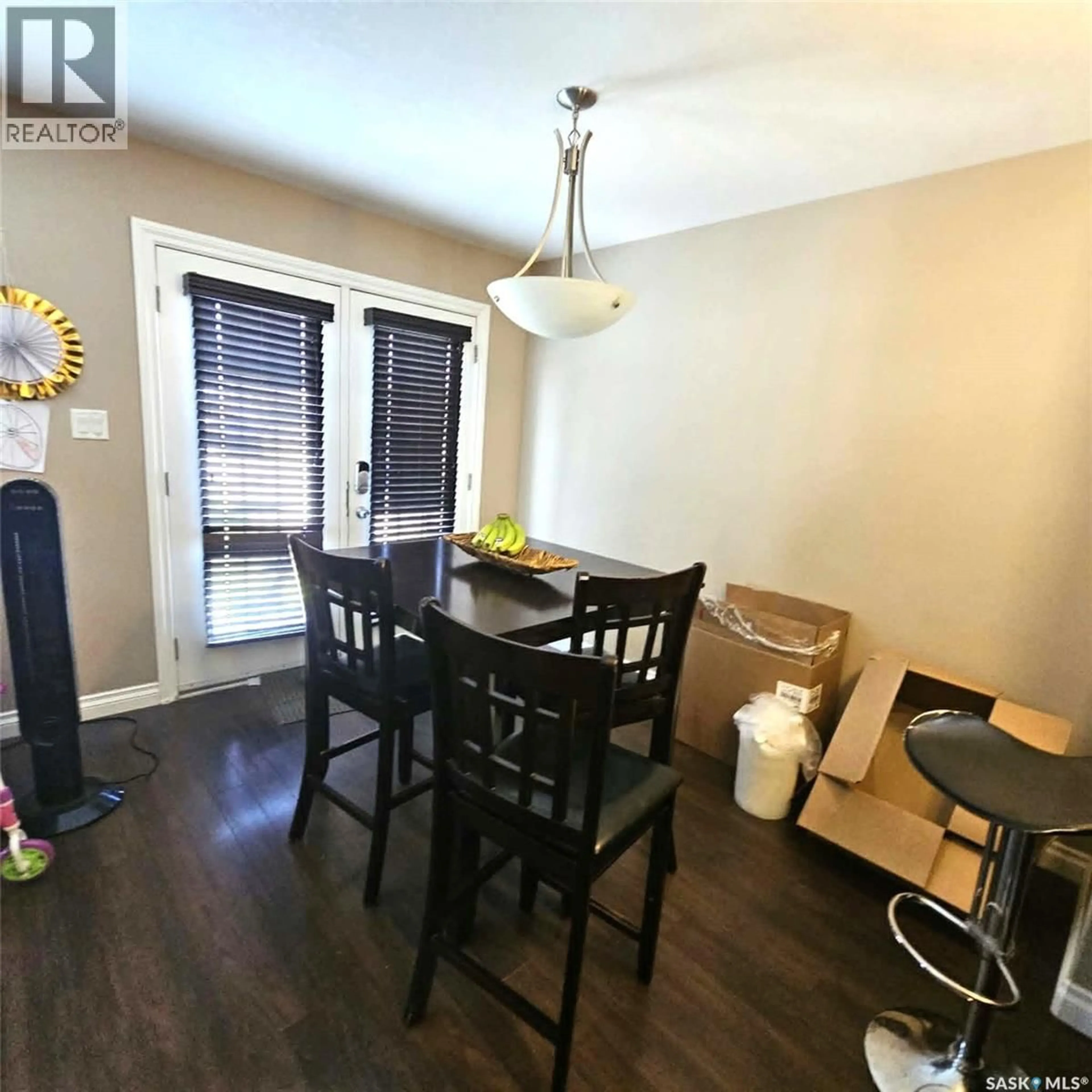Dining room, wood/laminate floor for 5008 AERIAL CRESCENT, Regina Saskatchewan S4W0C9