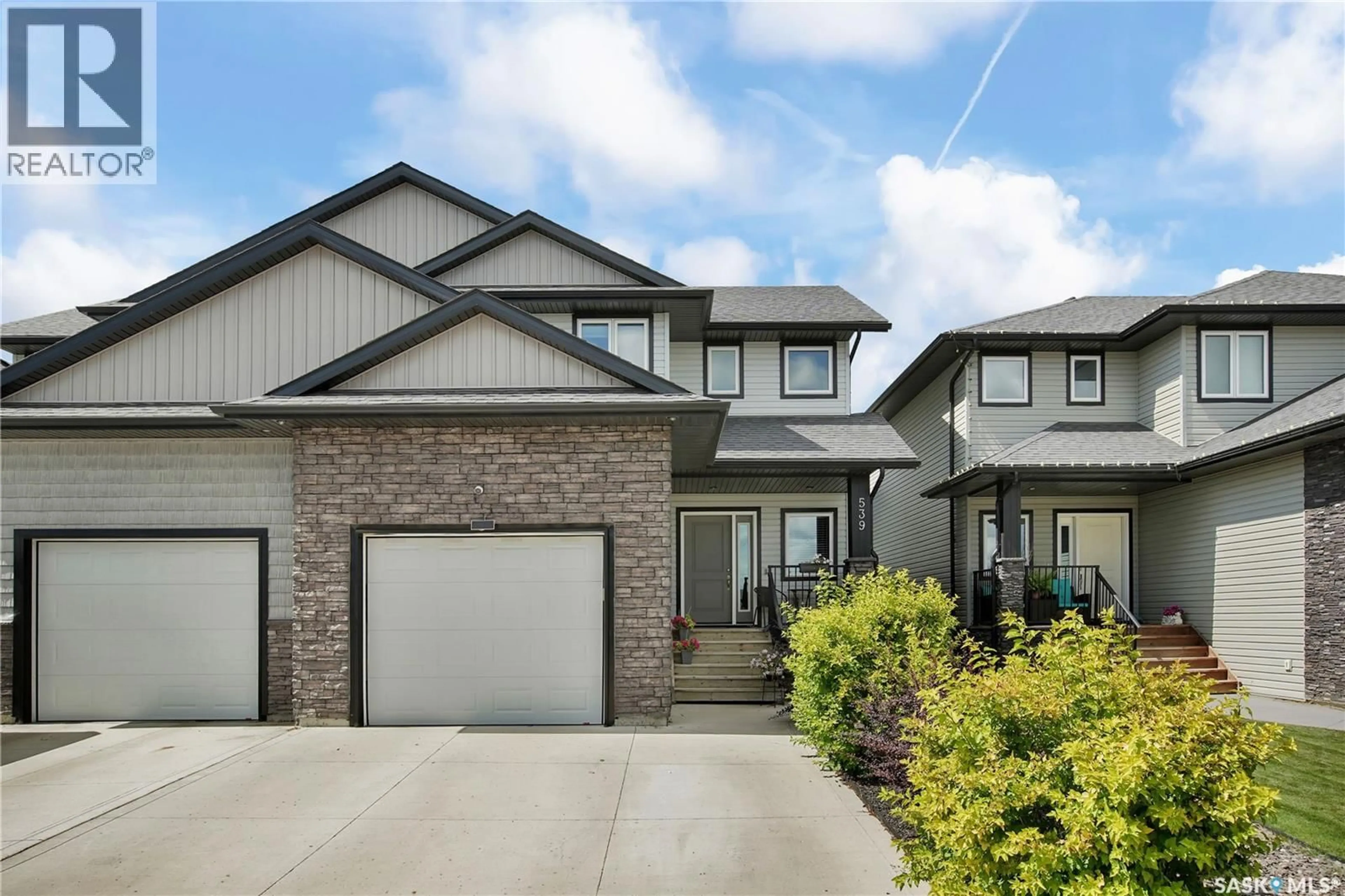 Home with vinyl exterior material, street for 539 MAPLE CRESCENT, Warman Saskatchewan S0K4S2