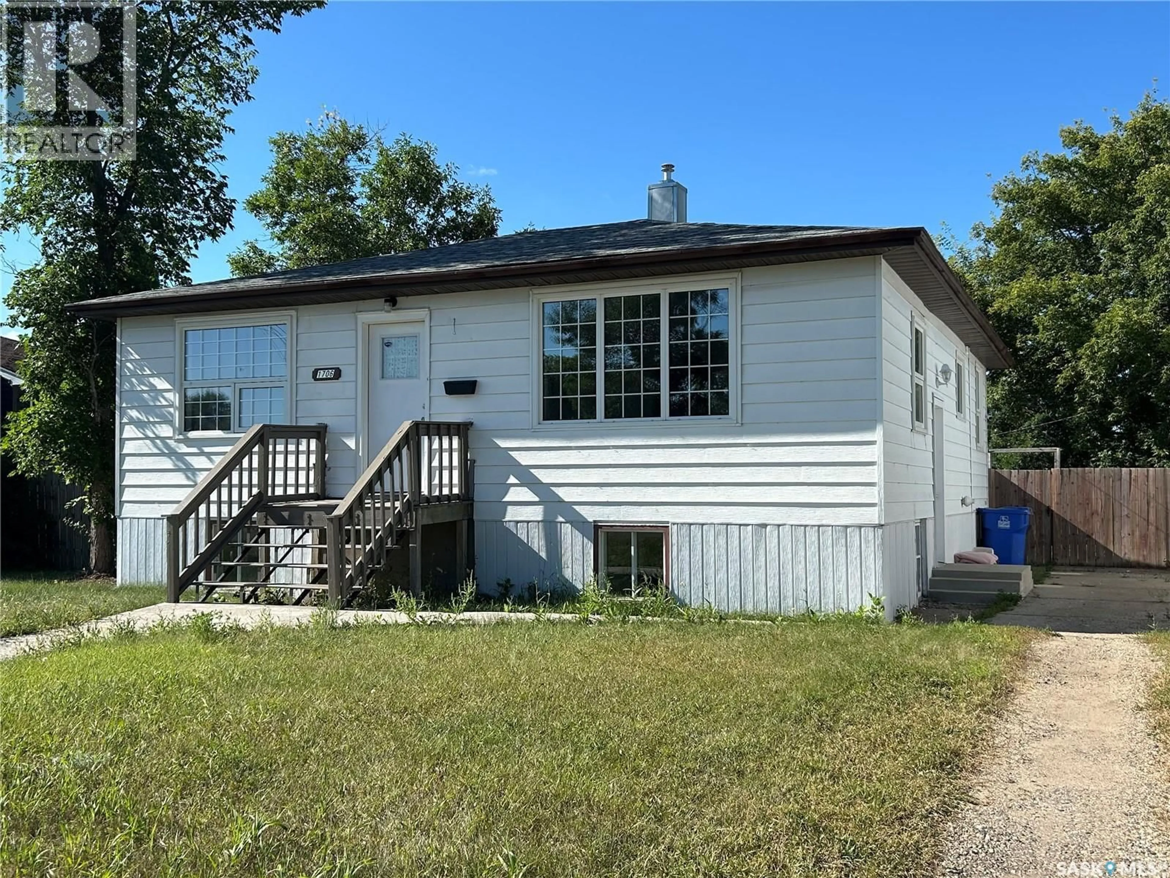 Home with vinyl exterior material, street for 1706 2ND STREET, Estevan Saskatchewan S4A0N3