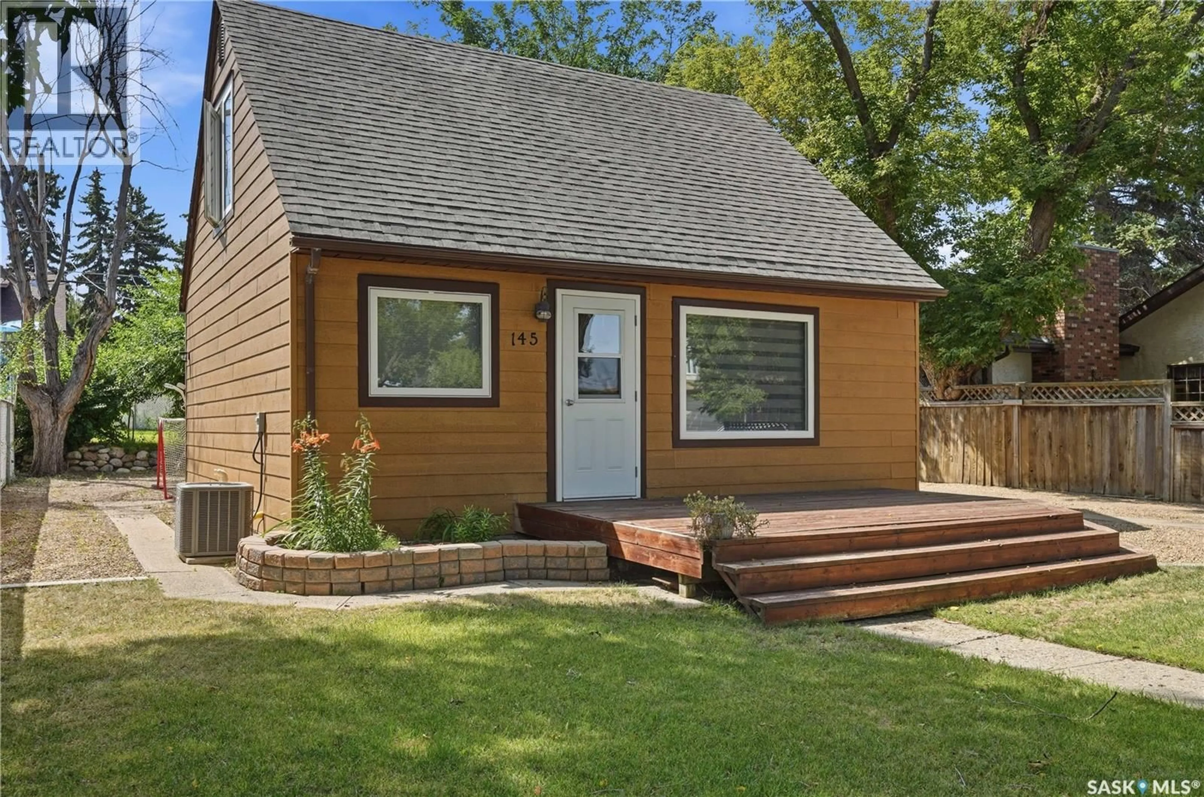Home with vinyl exterior material, street for 145 LILLOOET STREET E, Moose Jaw Saskatchewan S6H4S6