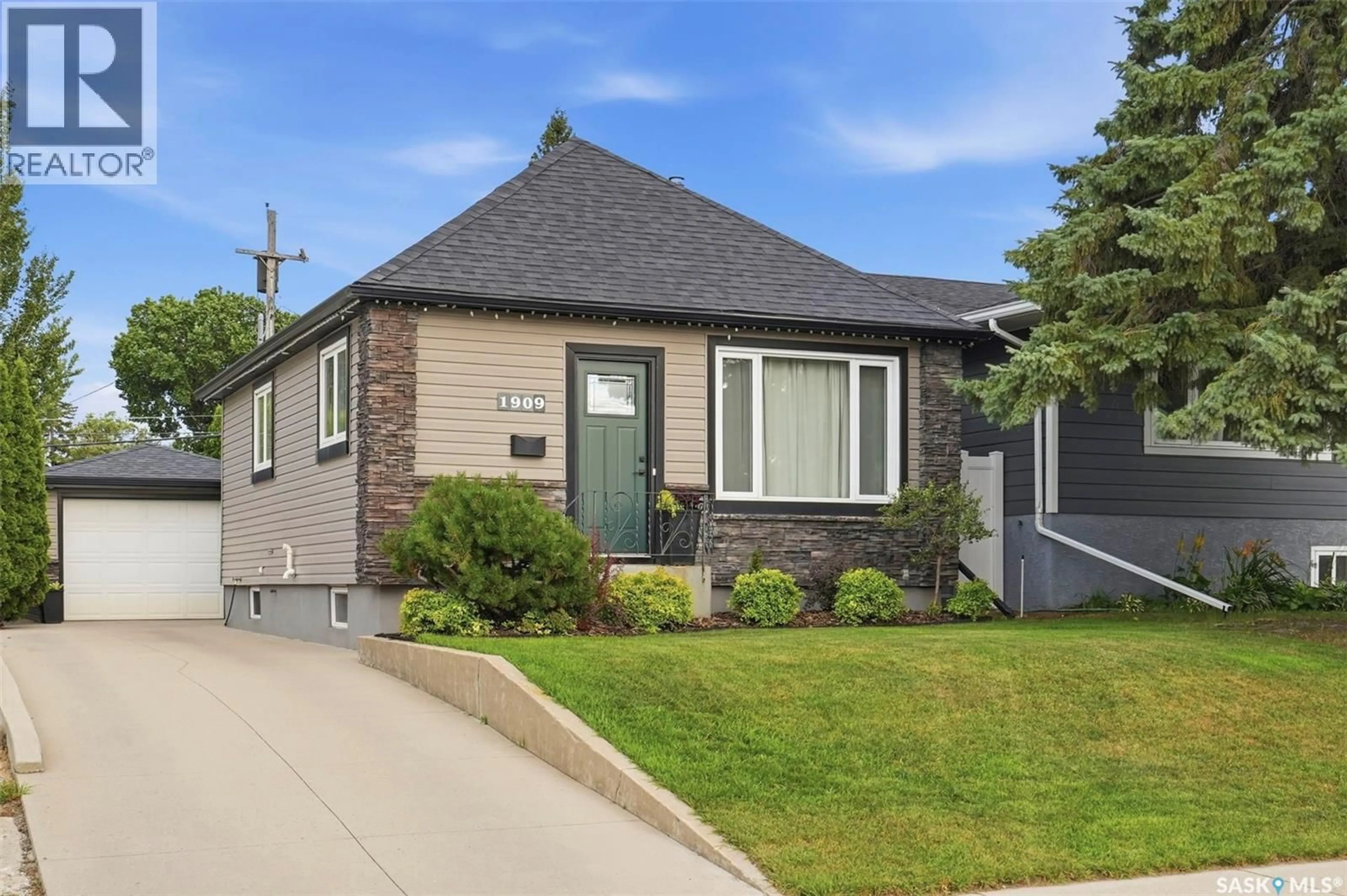 Home with brick exterior material, street for 1909 WILLIAM AVENUE, Saskatoon Saskatchewan S7J1A1