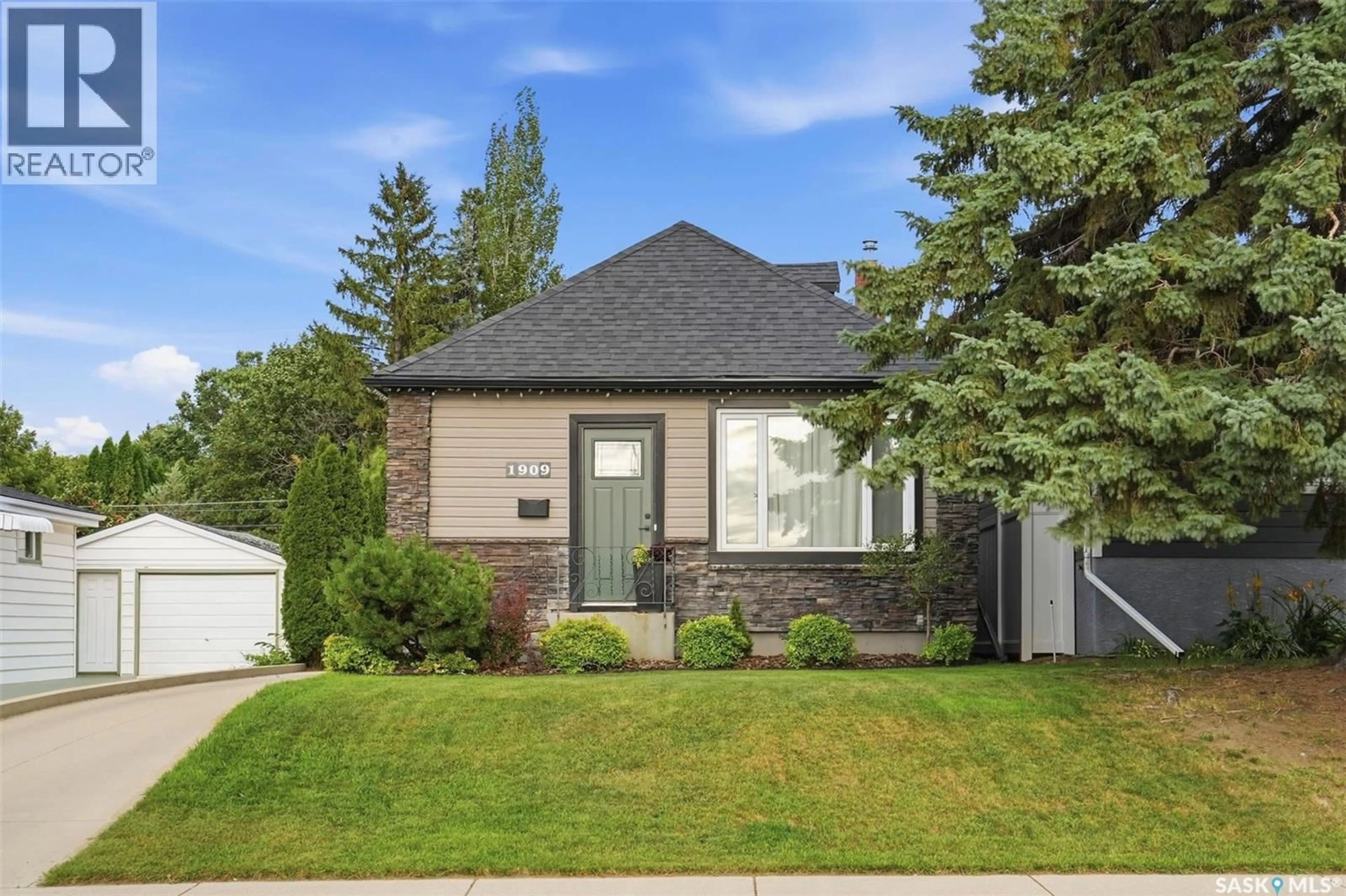 Home with brick exterior material, street for 1909 WILLIAM AVENUE, Saskatoon Saskatchewan S7J1A1