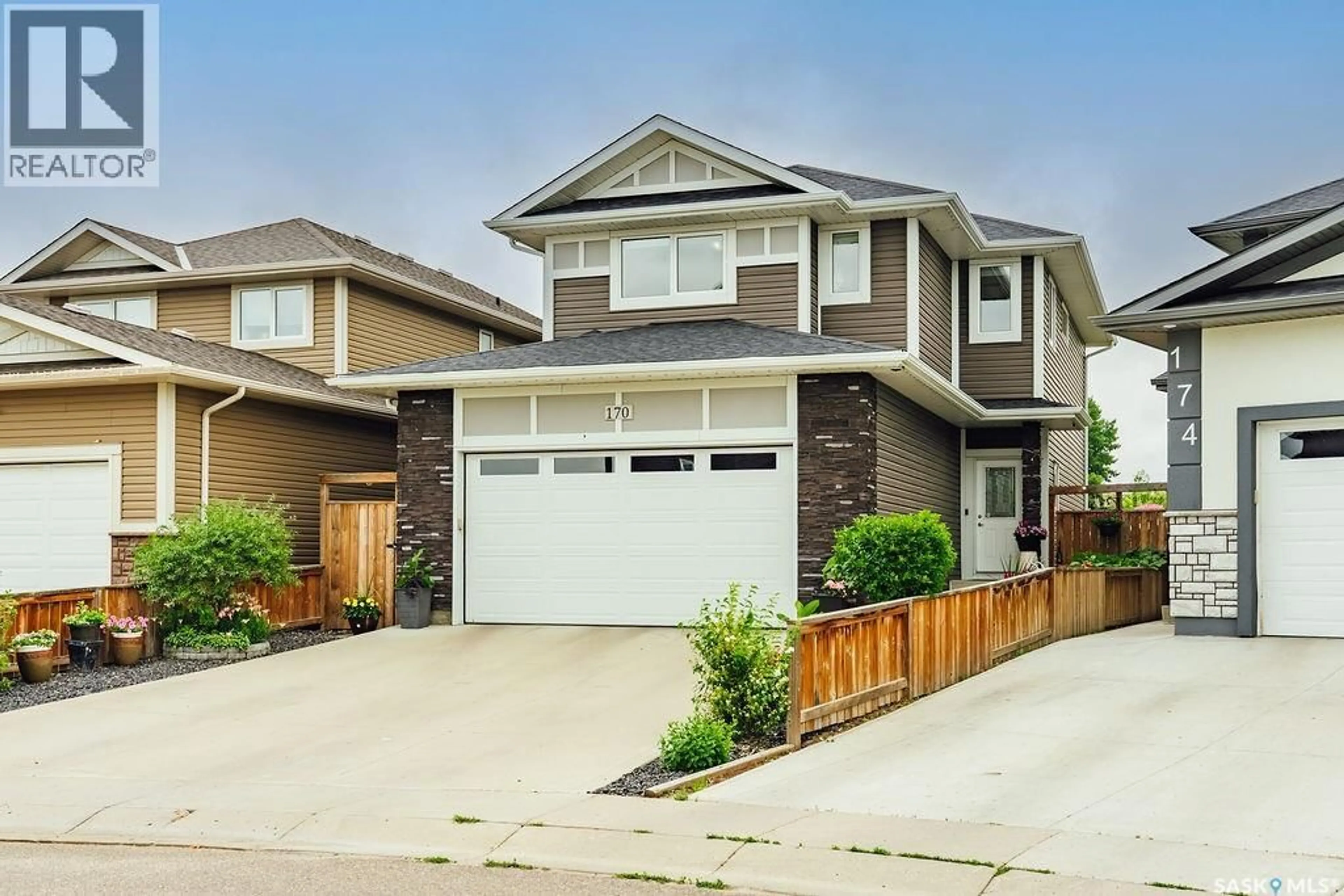 Home with vinyl exterior material, street for 170 PALLISER COURT, Saskatoon Saskatchewan S7L4P9