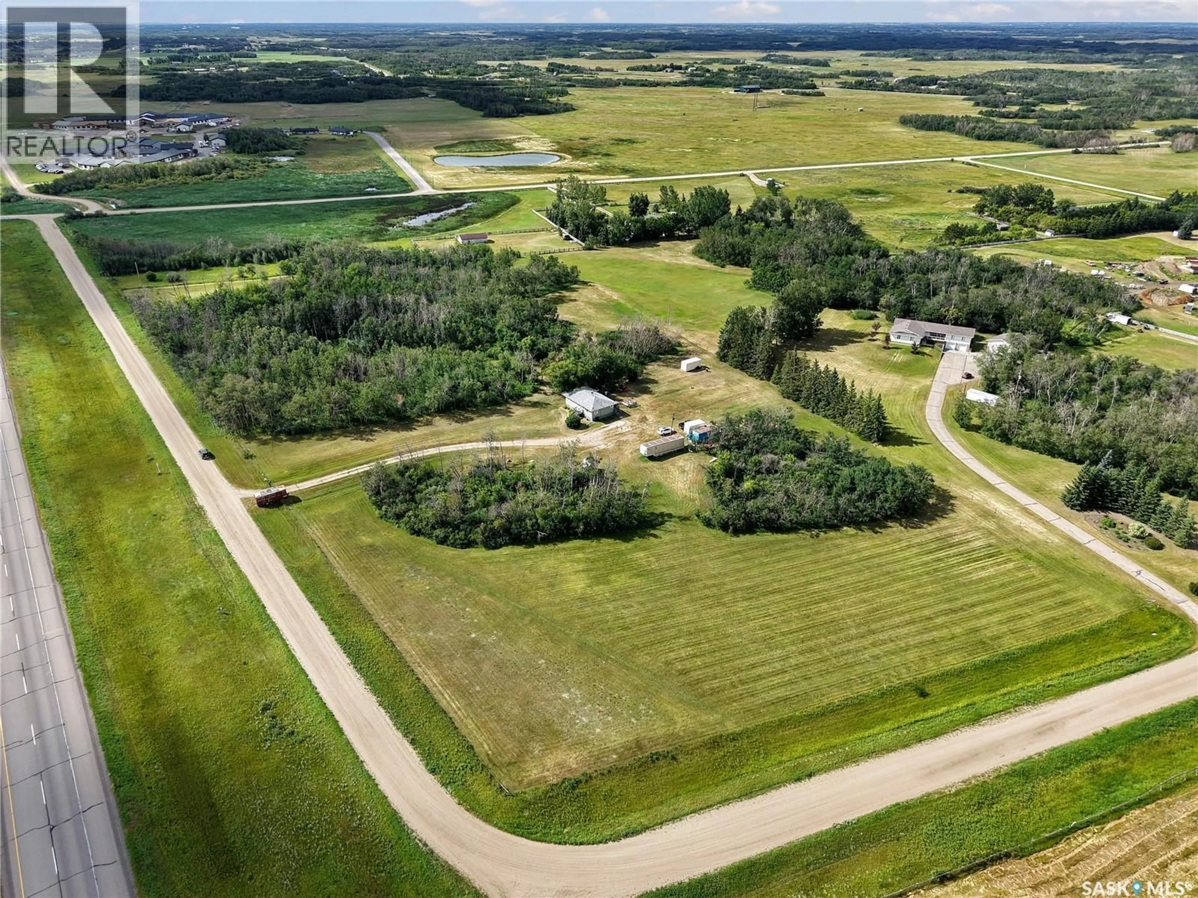 A pic from outside/outdoor area/front of a property/back of a property/a pic from drone, unknown for MACDONALD ACREAGE, Corman Park Rm No. 344 Saskatchewan S7K4R6