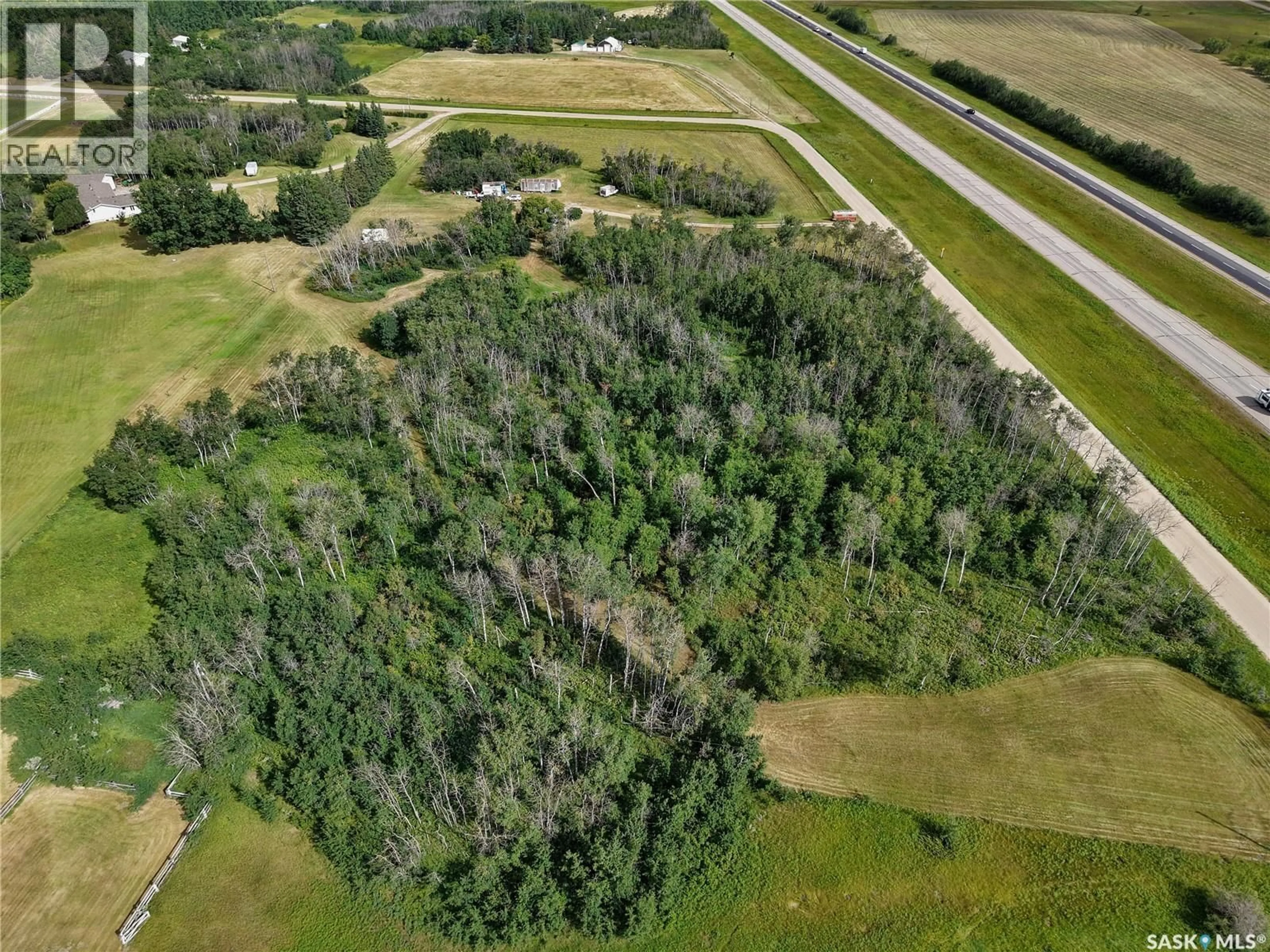 A pic from outside/outdoor area/front of a property/back of a property/a pic from drone, forest/trees view for MACDONALD ACREAGE, Corman Park Rm No. 344 Saskatchewan S7K4R6