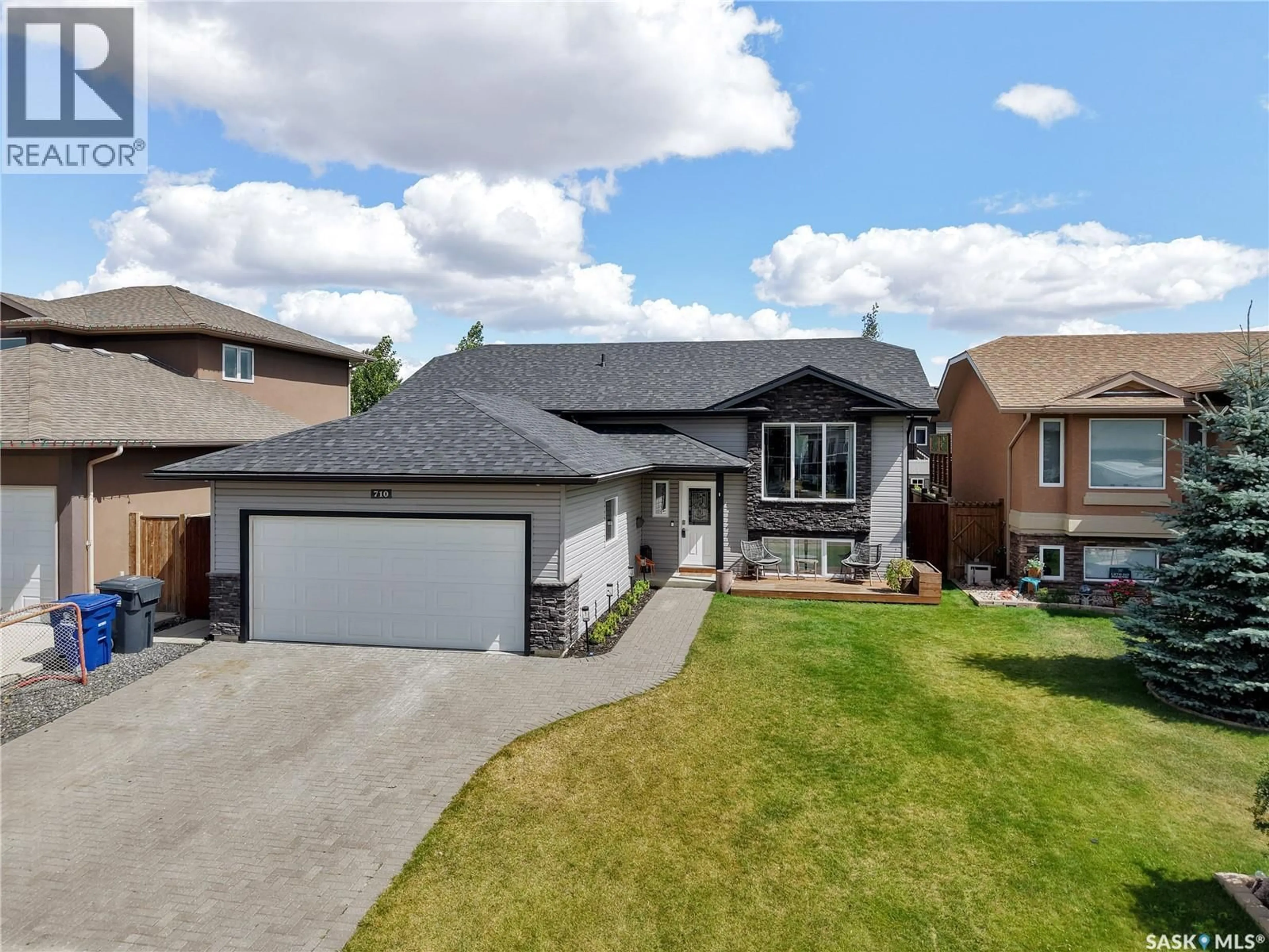 A pic from outside/outdoor area/front of a property/back of a property/a pic from drone, street for 710 REDWOOD CRESCENT, Warman Saskatchewan S0K4S2