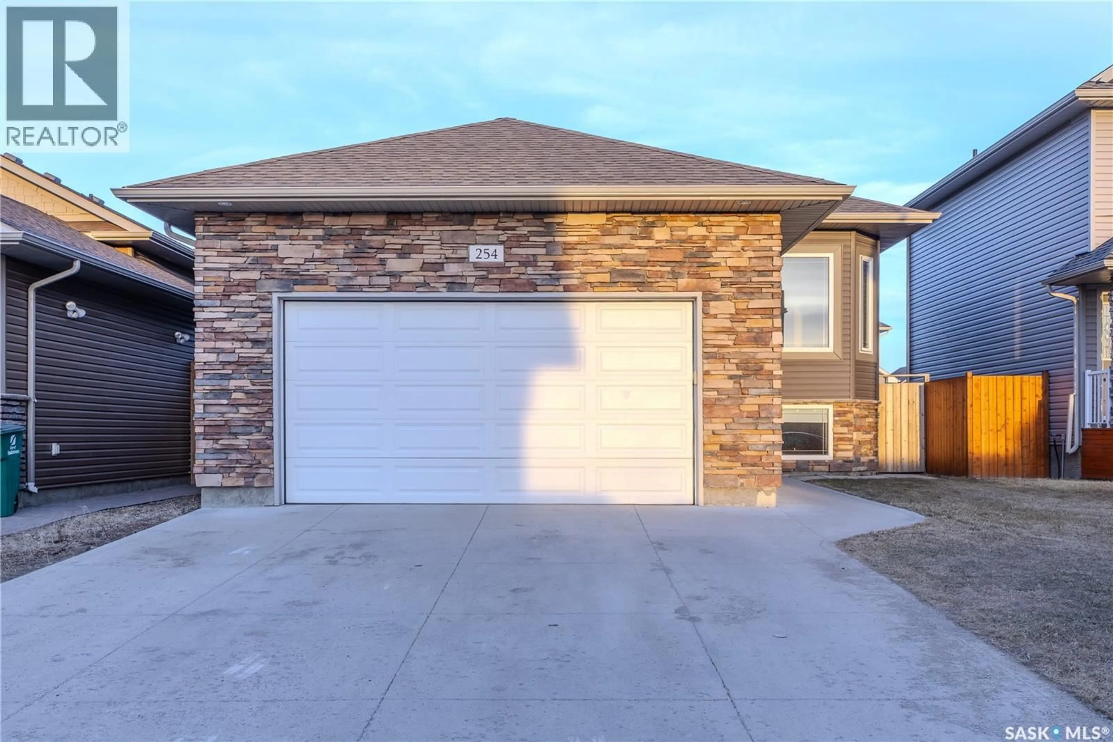 Home with brick exterior material, street for 254 MACINNES STREET, Saskatoon Saskatchewan S7T0T2