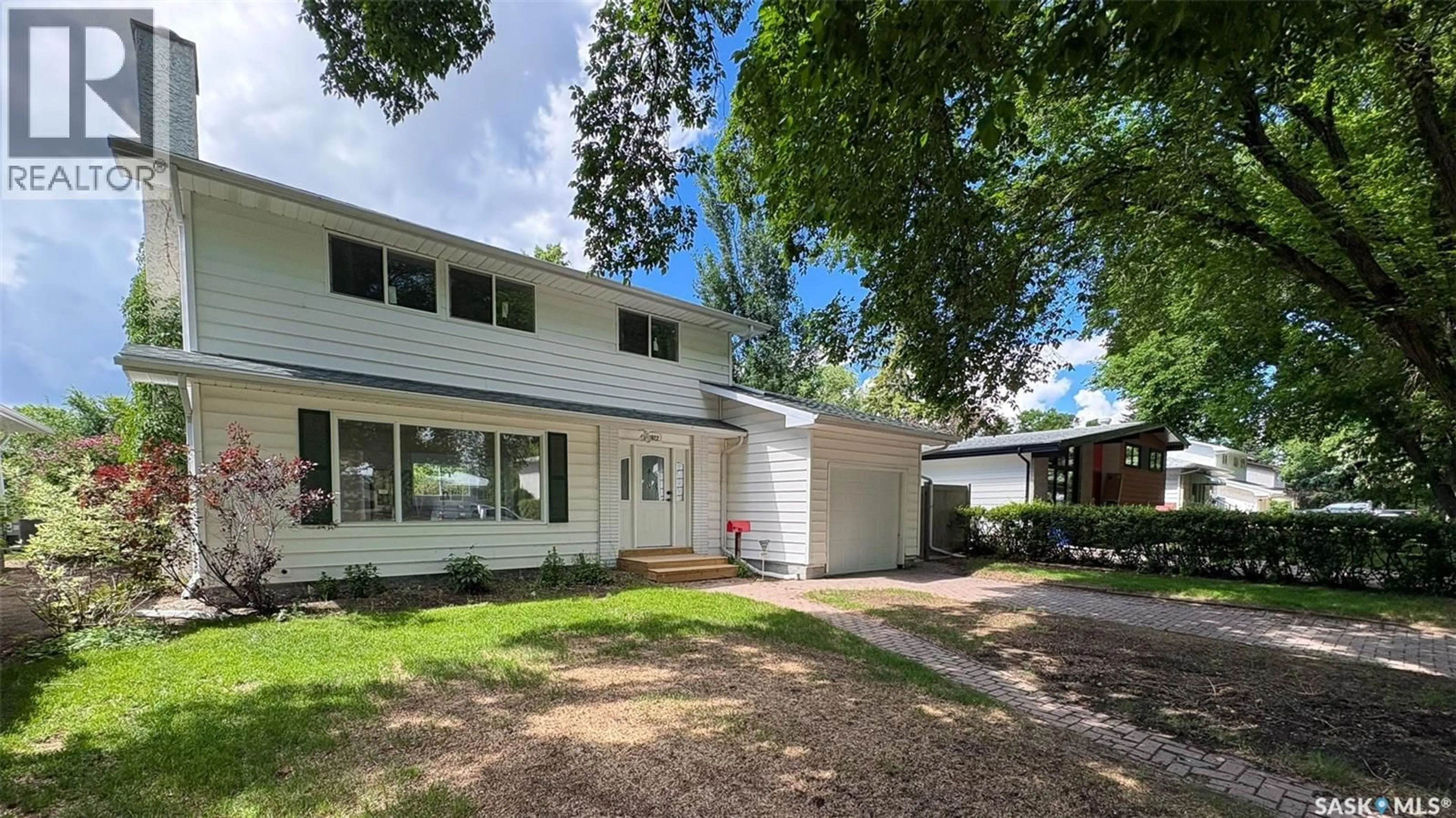 Home with vinyl exterior material, street for 3022 LACON STREET, Regina Saskatchewan S4N2A8