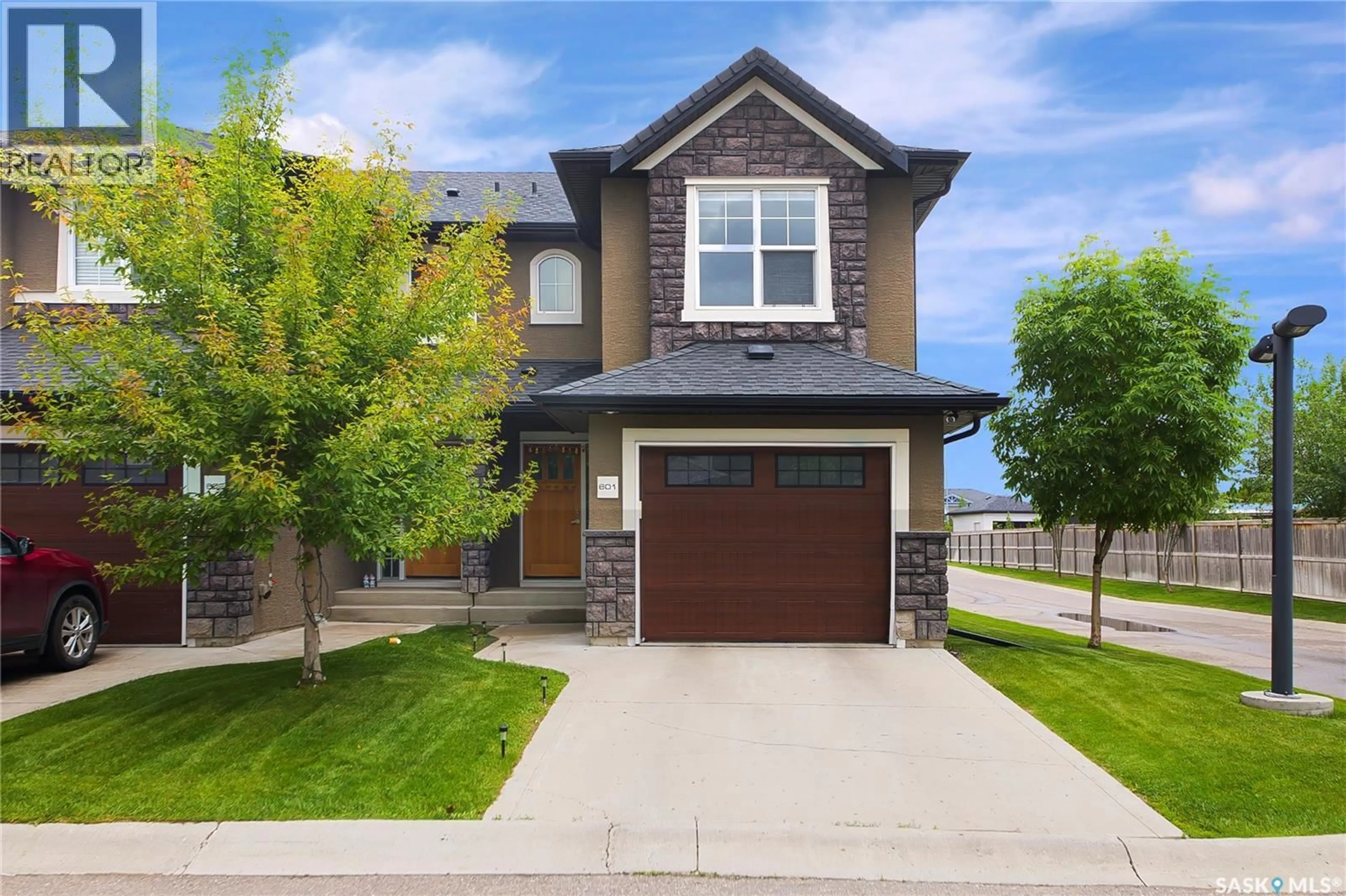 Home with brick exterior material, street for 2012 - 601 POHORECKY CRESCENT, Saskatoon Saskatchewan S7W0V4