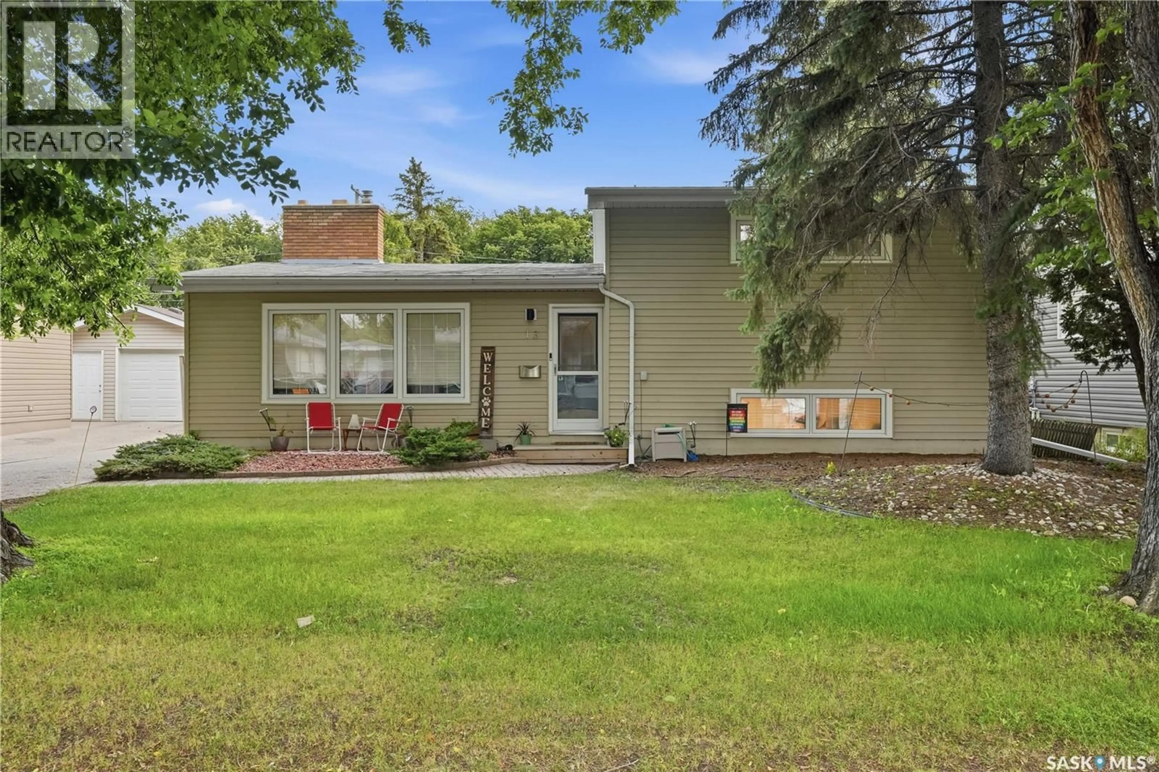 Home with vinyl exterior material, street for 13 ANDERSON AVENUE, Regina Saskatchewan S4S4R3