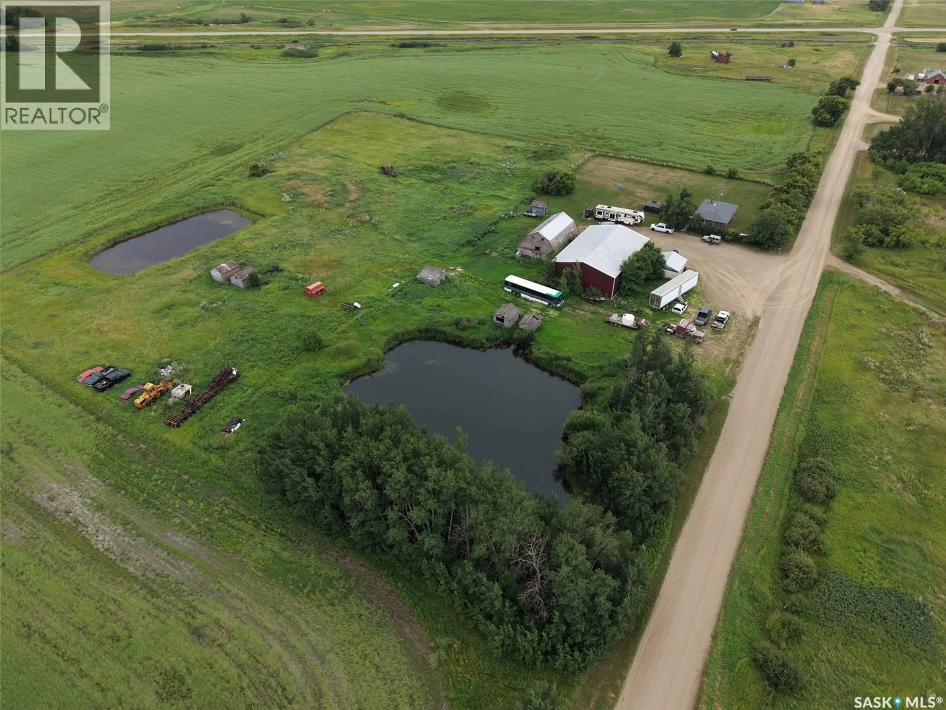 A pic from outside/outdoor area/front of a property/back of a property/a pic from drone, unknown for MCFALL ACREAGE, Enniskillen Rm No. 3 Saskatchewan S0C0Y0