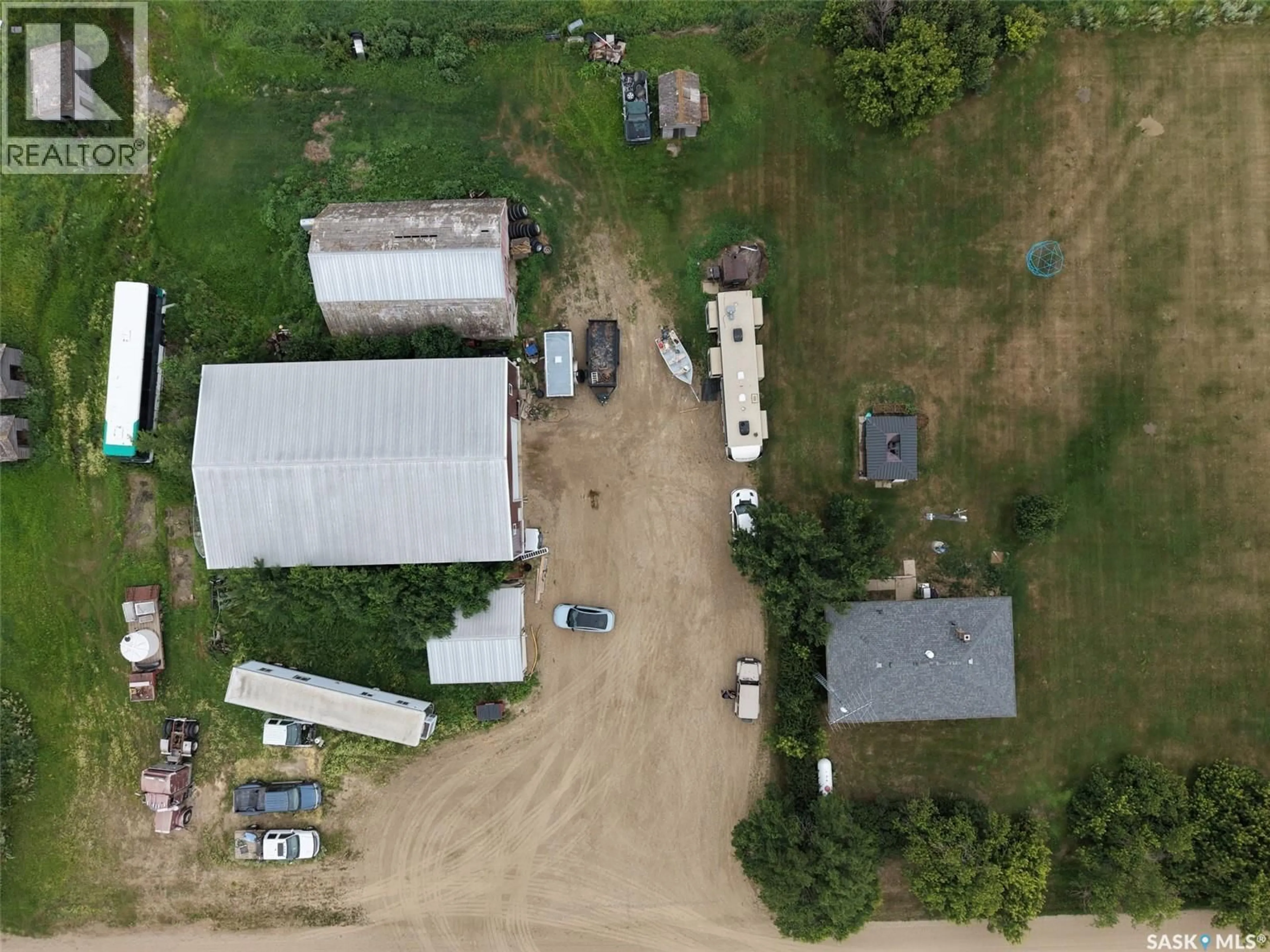 A pic from outside/outdoor area/front of a property/back of a property/a pic from drone, building for MCFALL ACREAGE, Enniskillen Rm No. 3 Saskatchewan S0C0Y0