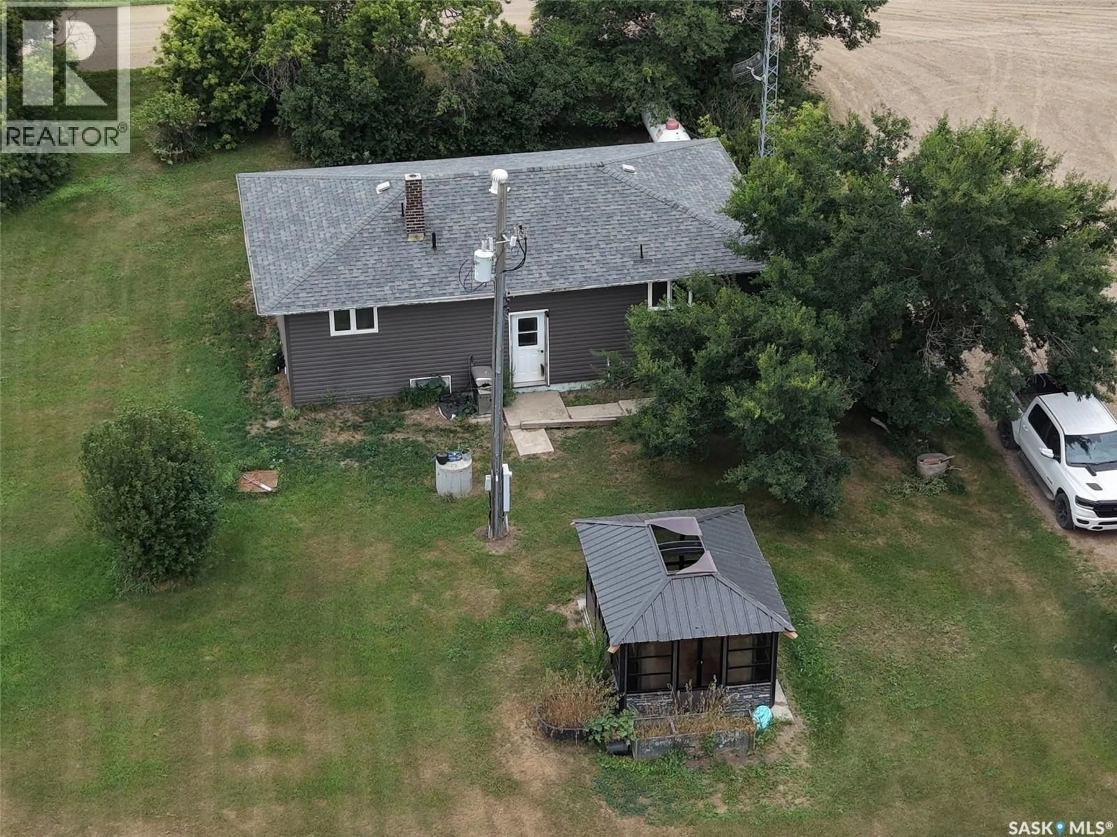 A pic from outside/outdoor area/front of a property/back of a property/a pic from drone, building for MCFALL ACREAGE, Enniskillen Rm No. 3 Saskatchewan S0C0Y0
