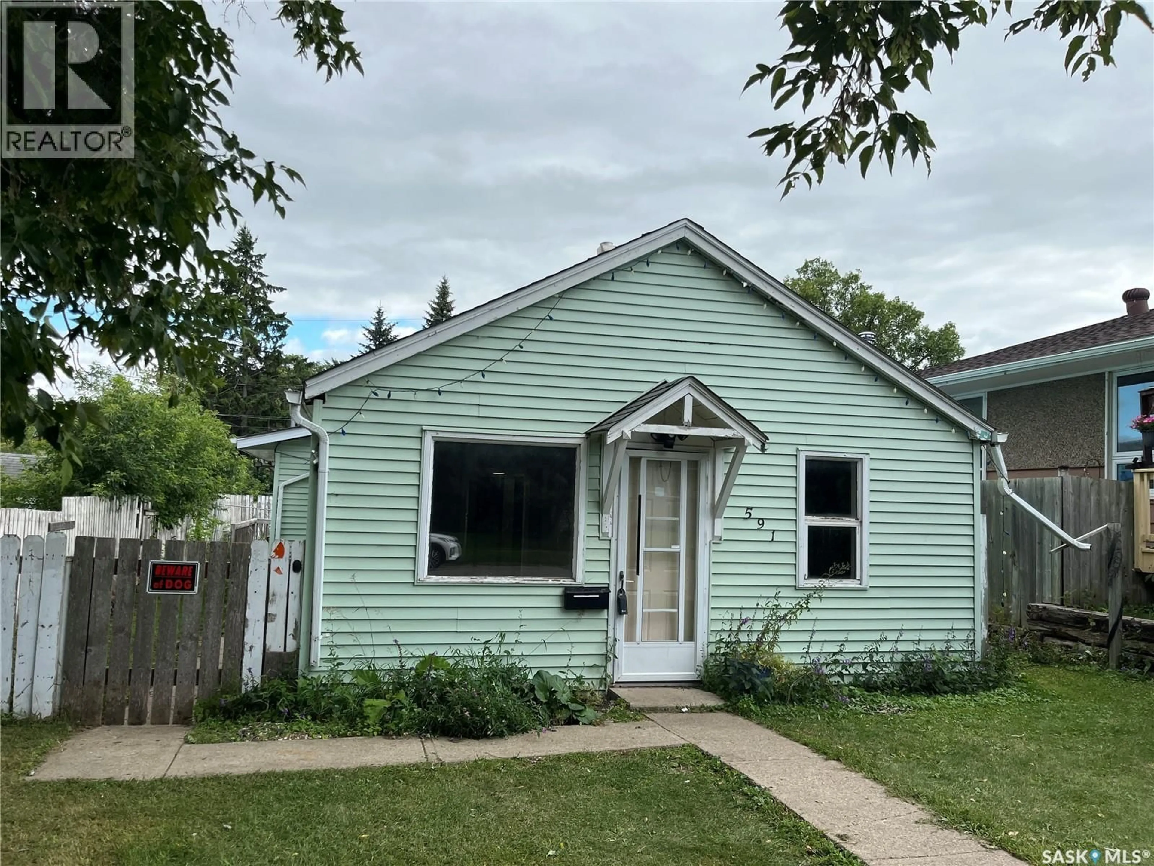 Home with vinyl exterior material, street for 591 23RD STREET, Prince Albert Saskatchewan S6V1R1