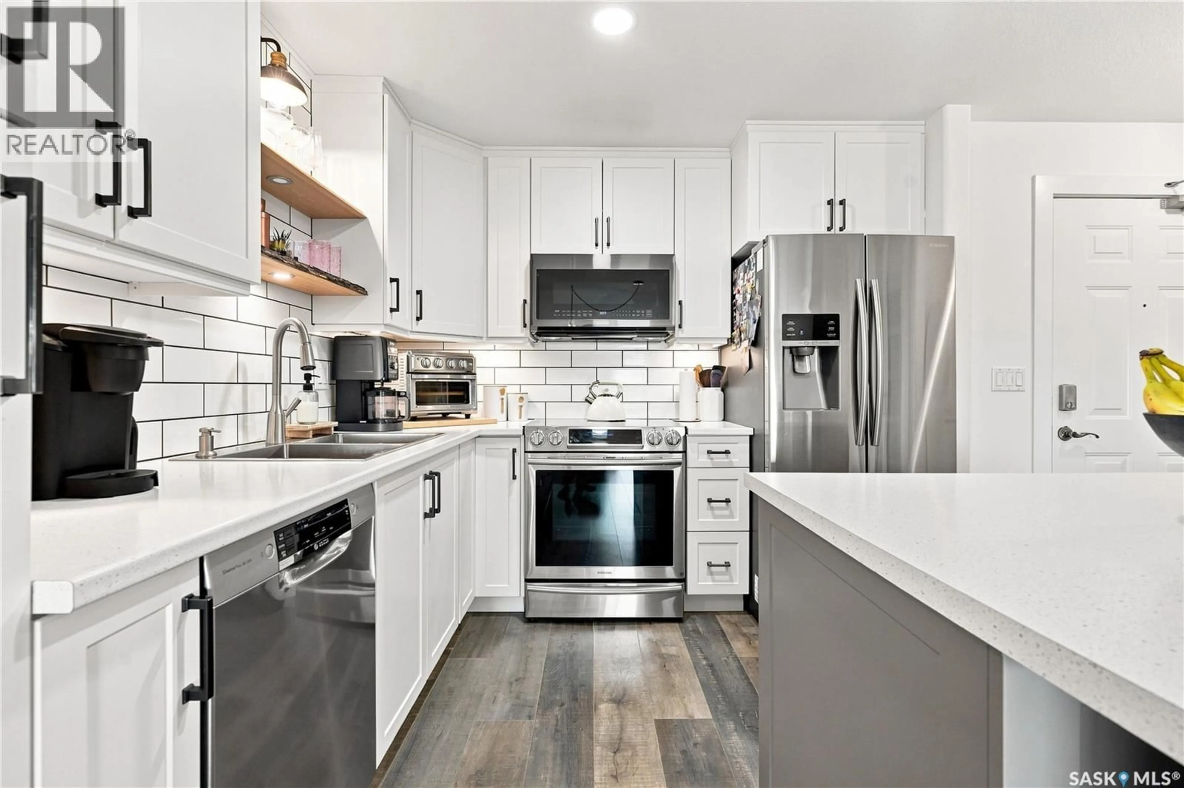 Open concept kitchen, ceramic/tile floor for 301 235 HEROLD TERRACE, Saskatoon Saskatchewan S7V1J2
