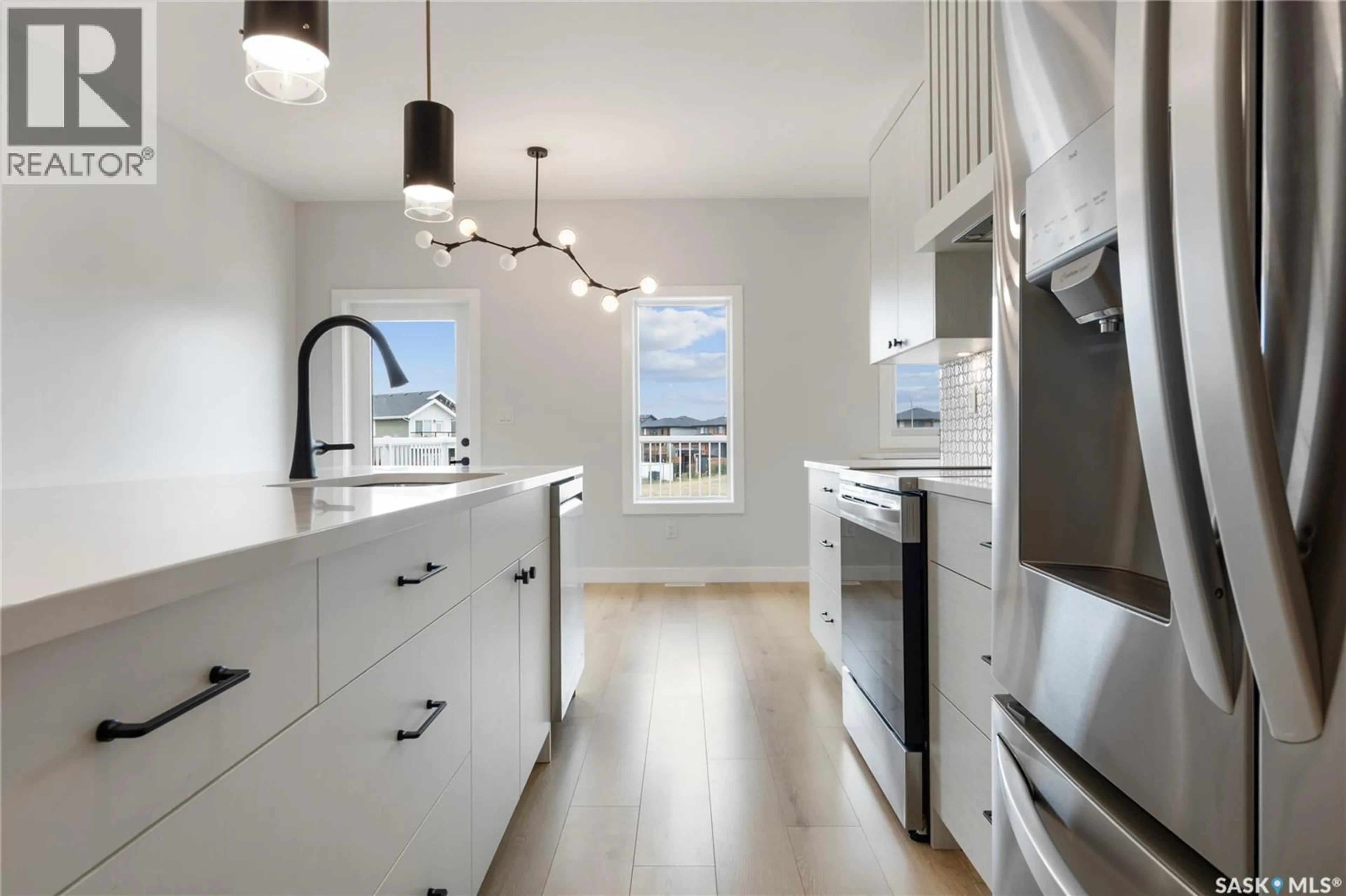 Open concept kitchen, unknown for 371 LESKIW BEND, Saskatoon Saskatchewan S7V1R5