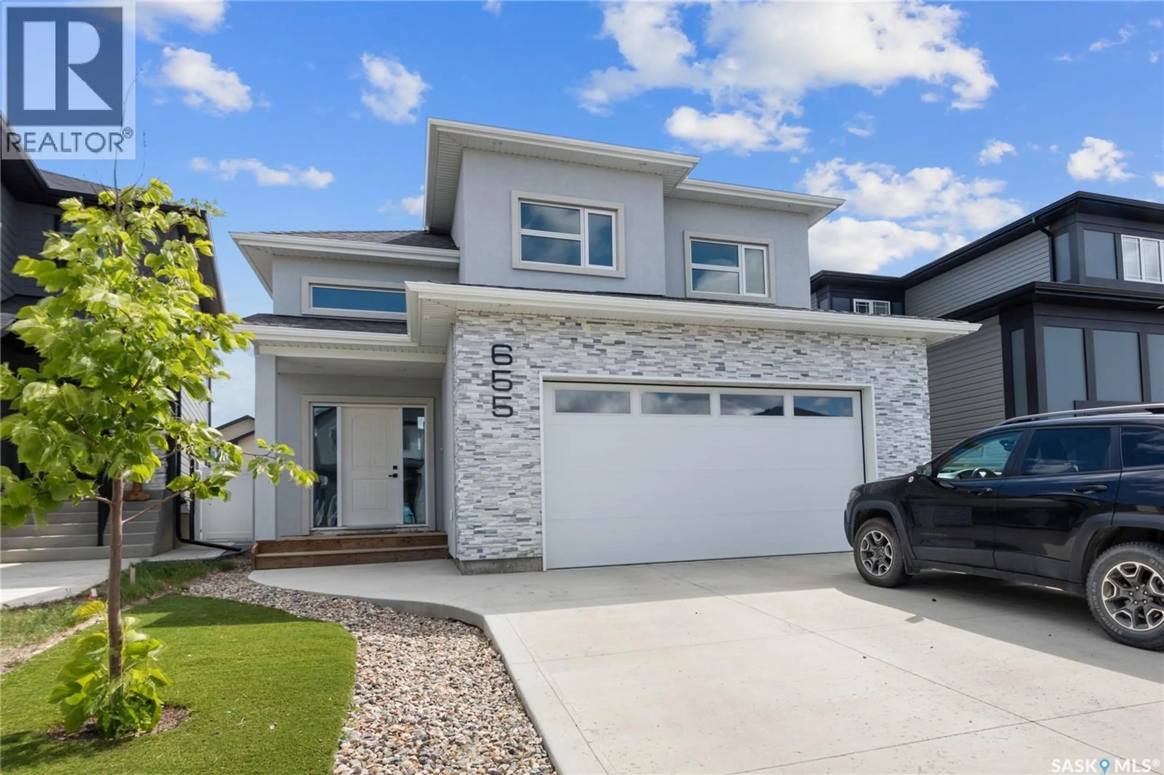 Home with brick exterior material, street for 655 UNDERHILL ROAD, Saskatoon Saskatchewan S7V1N8