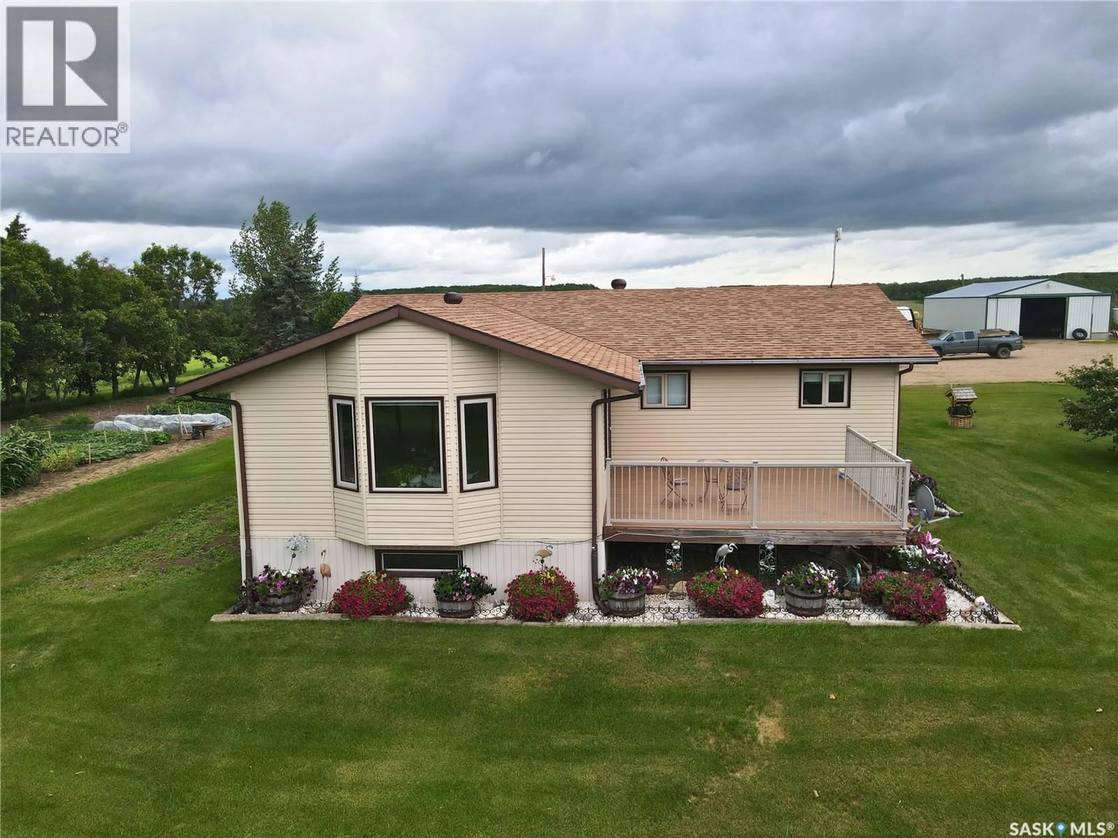 A pic from outside/outdoor area/front of a property/back of a property/a pic from drone, unknown for FOSTER ACREAGE, Birch Hills Rm No. 460 Saskatchewan S0J0G0