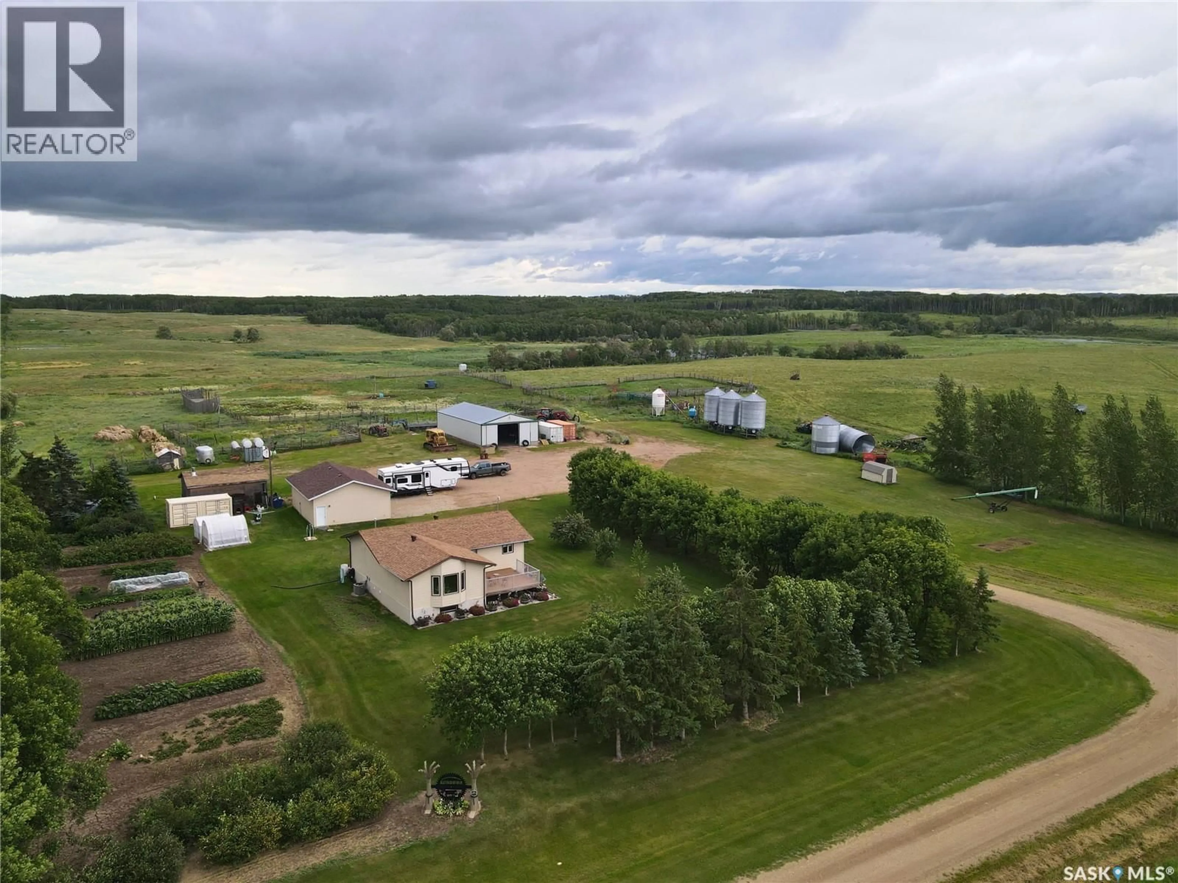 A pic from outside/outdoor area/front of a property/back of a property/a pic from drone, building for FOSTER ACREAGE, Birch Hills Rm No. 460 Saskatchewan S0J0G0