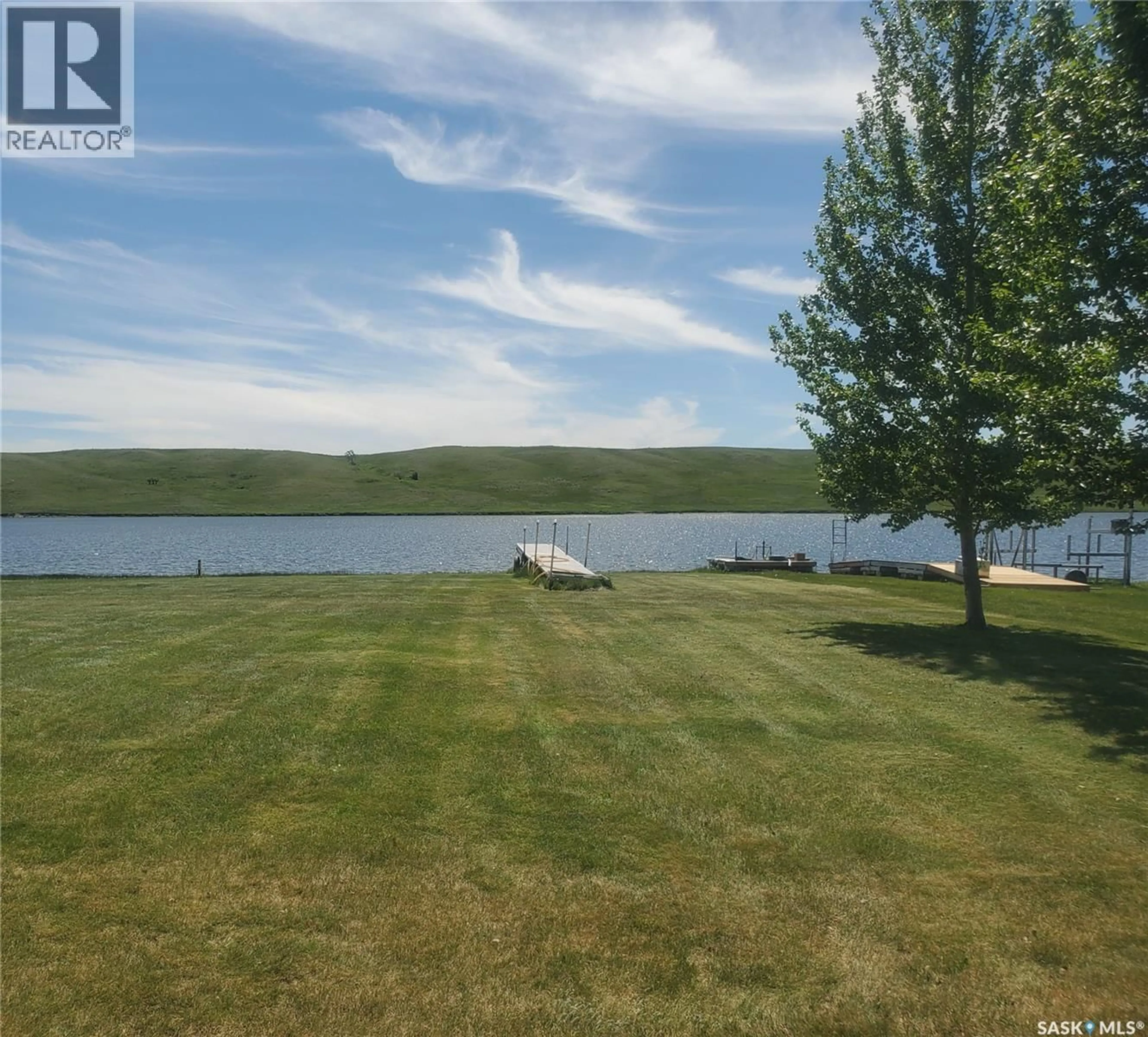 A pic from outside/outdoor area/front of a property/back of a property/a pic from drone, water/lake/river/ocean view for DANNY DRIVE, Reid Lake Saskatchewan S0N2X0