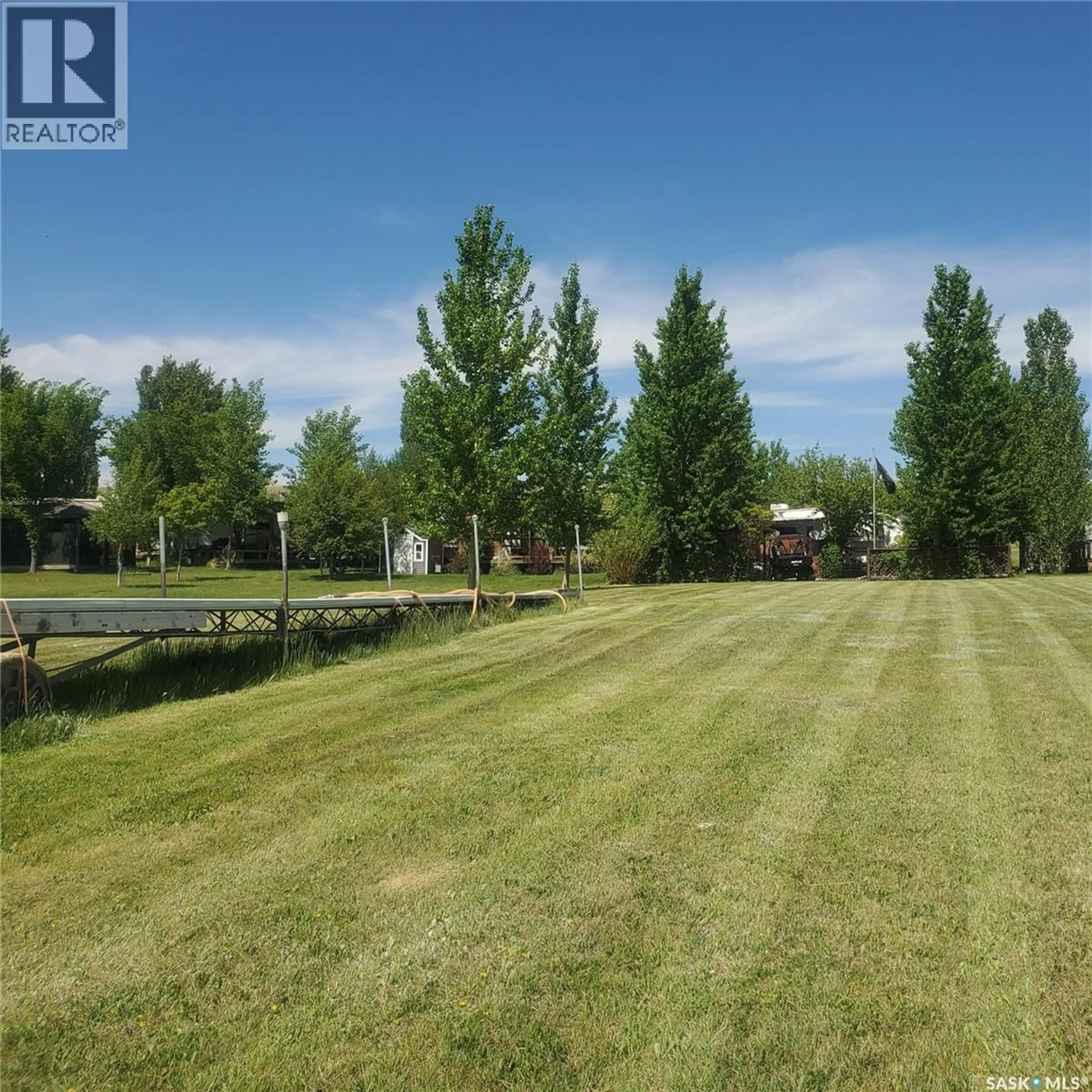 A pic from outside/outdoor area/front of a property/back of a property/a pic from drone, water/lake/river/ocean view for DANNY DRIVE, Reid Lake Saskatchewan S0N2X0