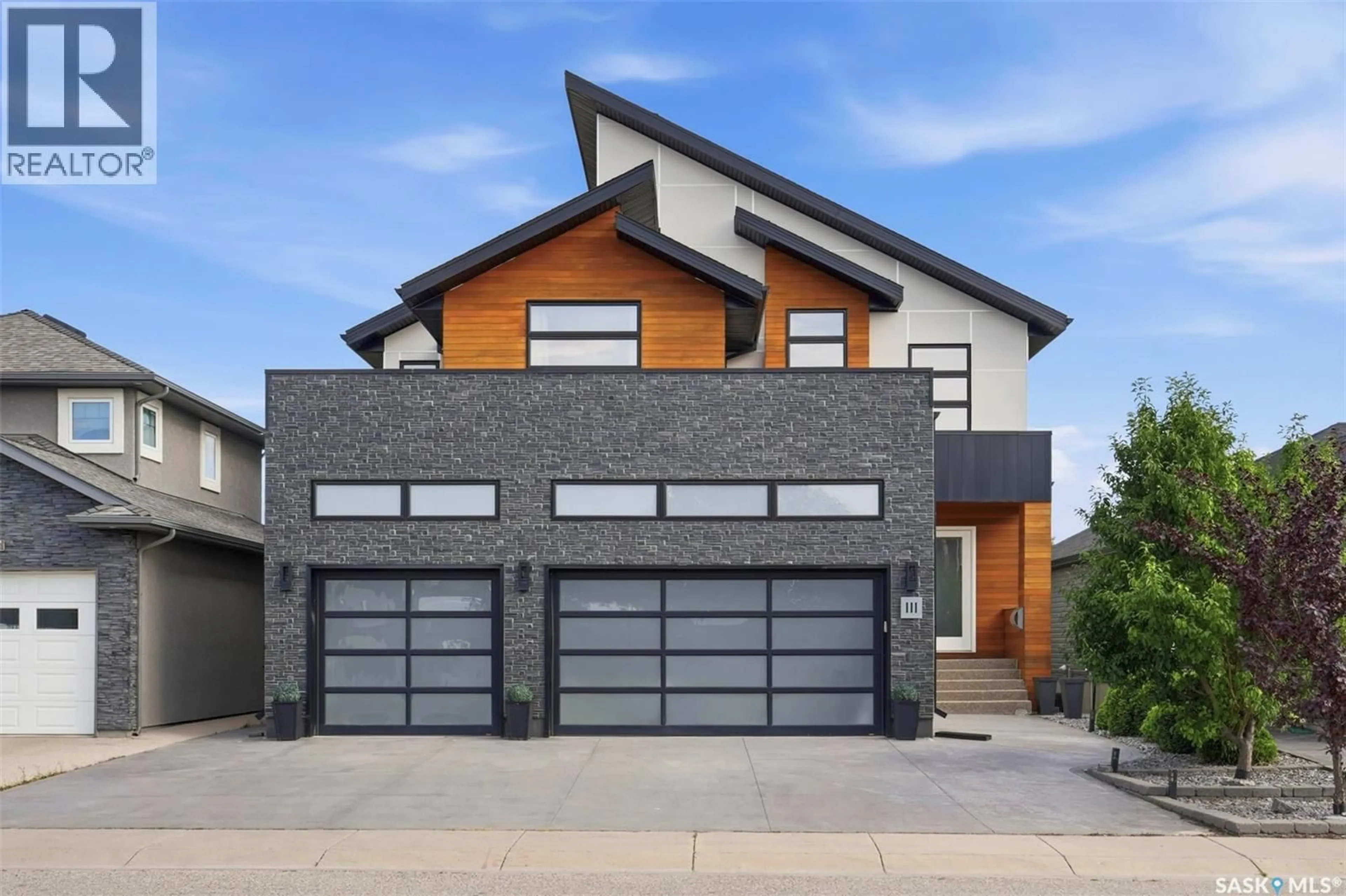 Home with brick exterior material, street for 111 FLEMING CRESCENT, Saskatoon Saskatchewan S7W0E7