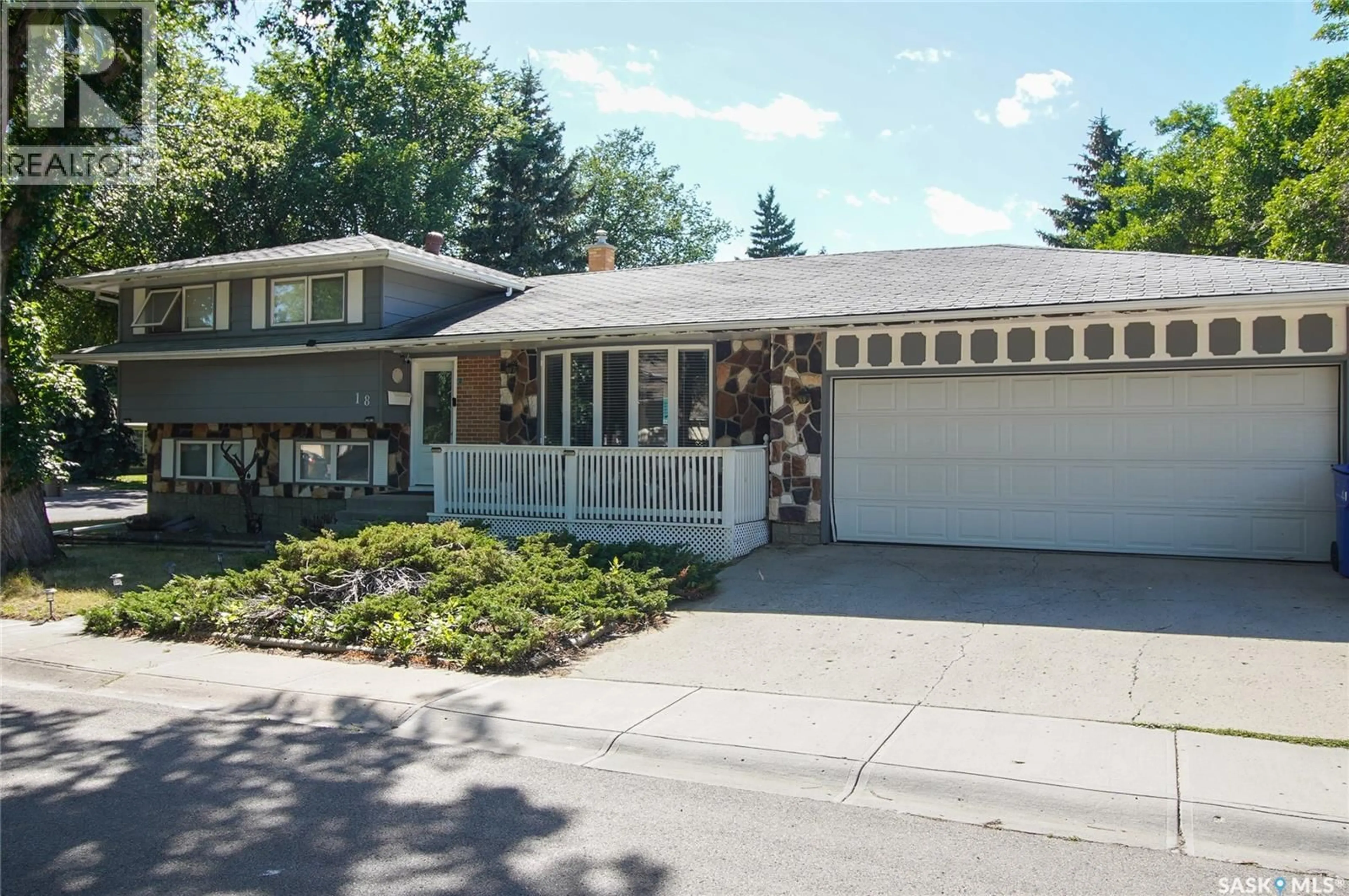 Home with vinyl exterior material, street for 18 KYLE STREET, Regina Saskatchewan S4R6R6