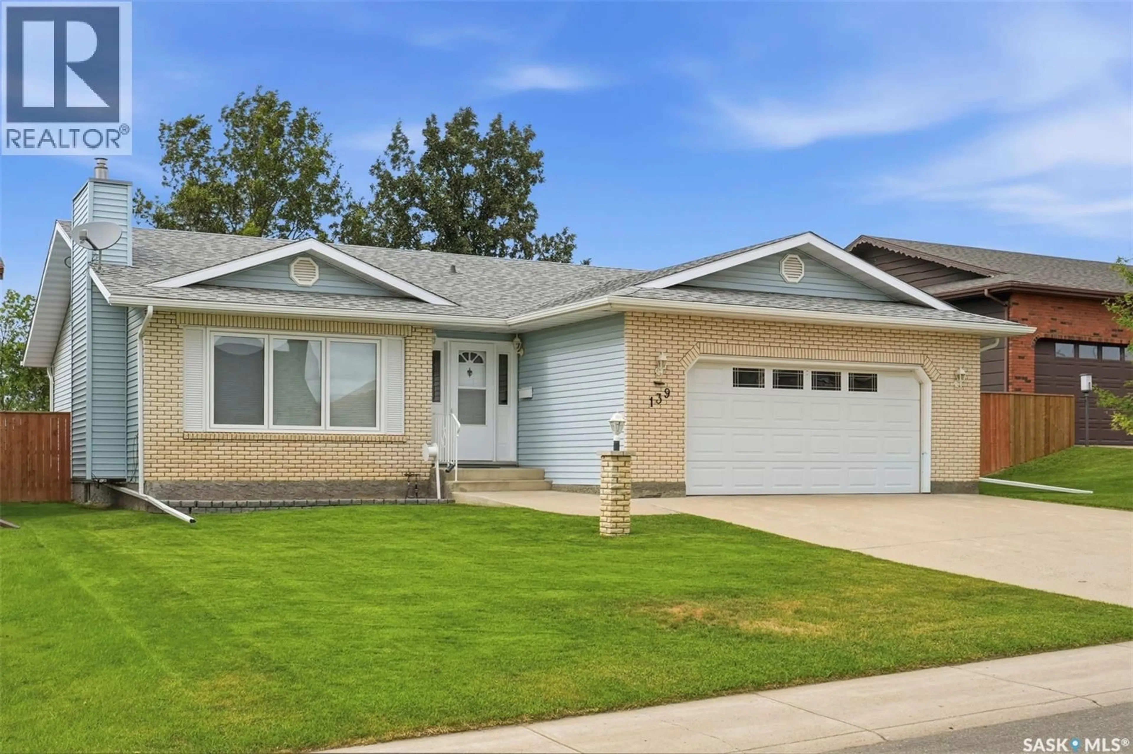 Home with vinyl exterior material, street for 139 WRIGHT CRESCENT, Biggar Saskatchewan S0K0M0
