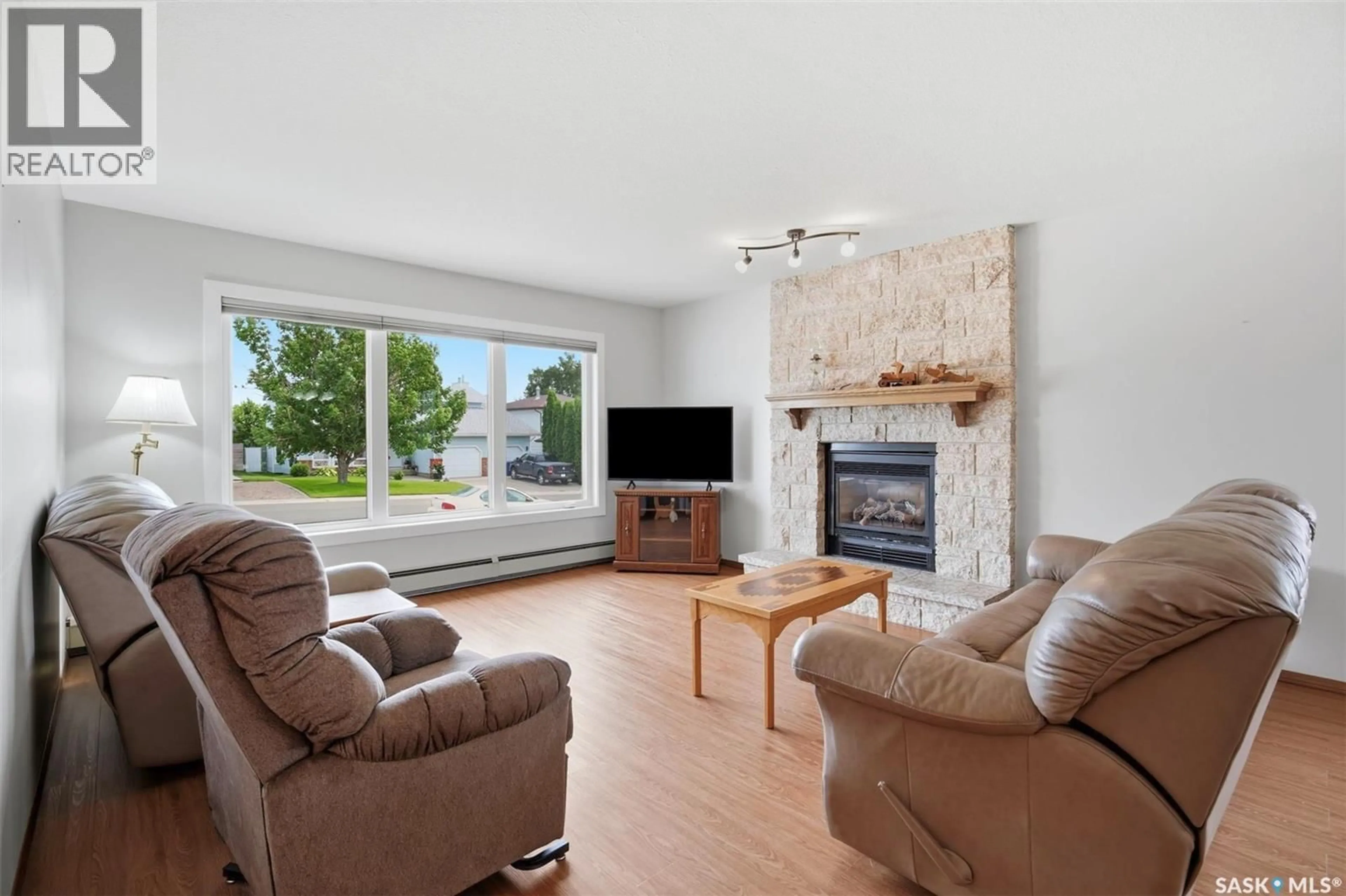 Living room with furniture, unknown for 139 WRIGHT CRESCENT, Biggar Saskatchewan S0K0M0